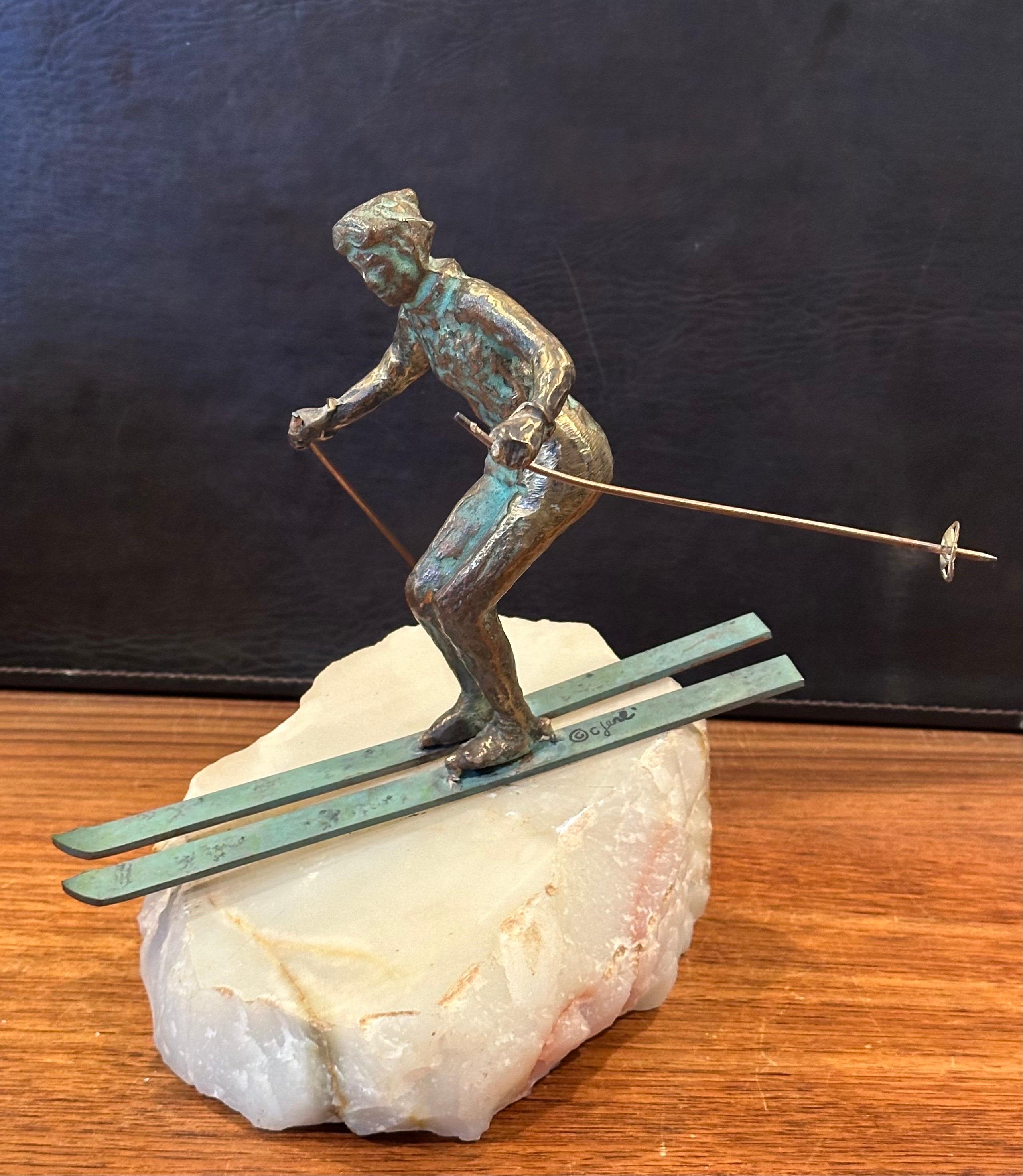Downhill Skier-Bronze-Skulptur auf Onyxsockel von C. Jere (20. Jahrhundert) im Angebot