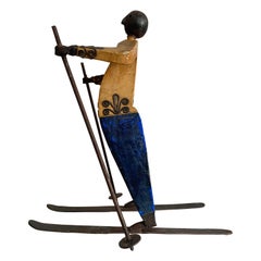 Sculpture de skieur sur des contreforts de Manuel Felgurez