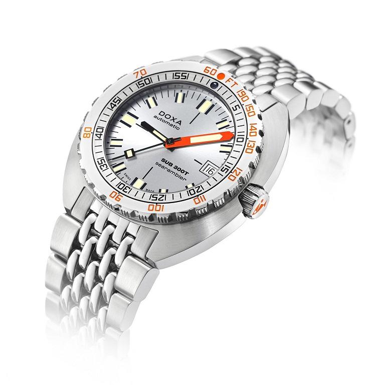 In 1969, DOXA launched the SUB 300T Conquistador, the first general public diver's watch equipped with a helium release valve. 50 years later, the new SUB 300T presented in September 2019 pays tribute to the groundbreaking original.

This 3-hand