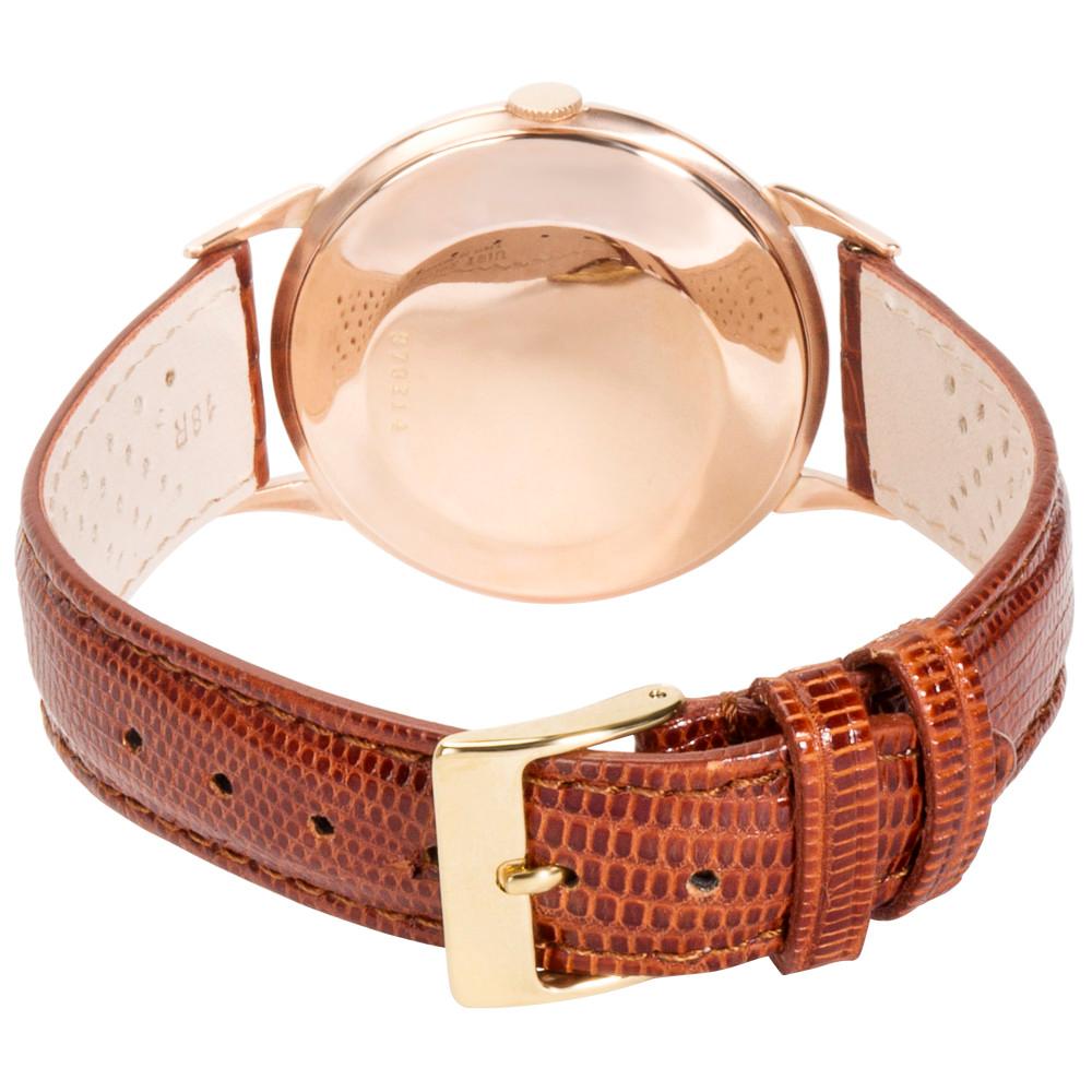 Doxa Vintage 129 Women's Watch in 14K Rose Gold
 
 SKU: 027053
 
 PRIMARY DETAILS
 Brand: Doxa
 Model: 129
 Country of Origin: Switzerland
 Movement Type: Mechanical: Automatic/Kinetic
 Year of Manufacture: 1950-1959
 Condition: Small scratches on