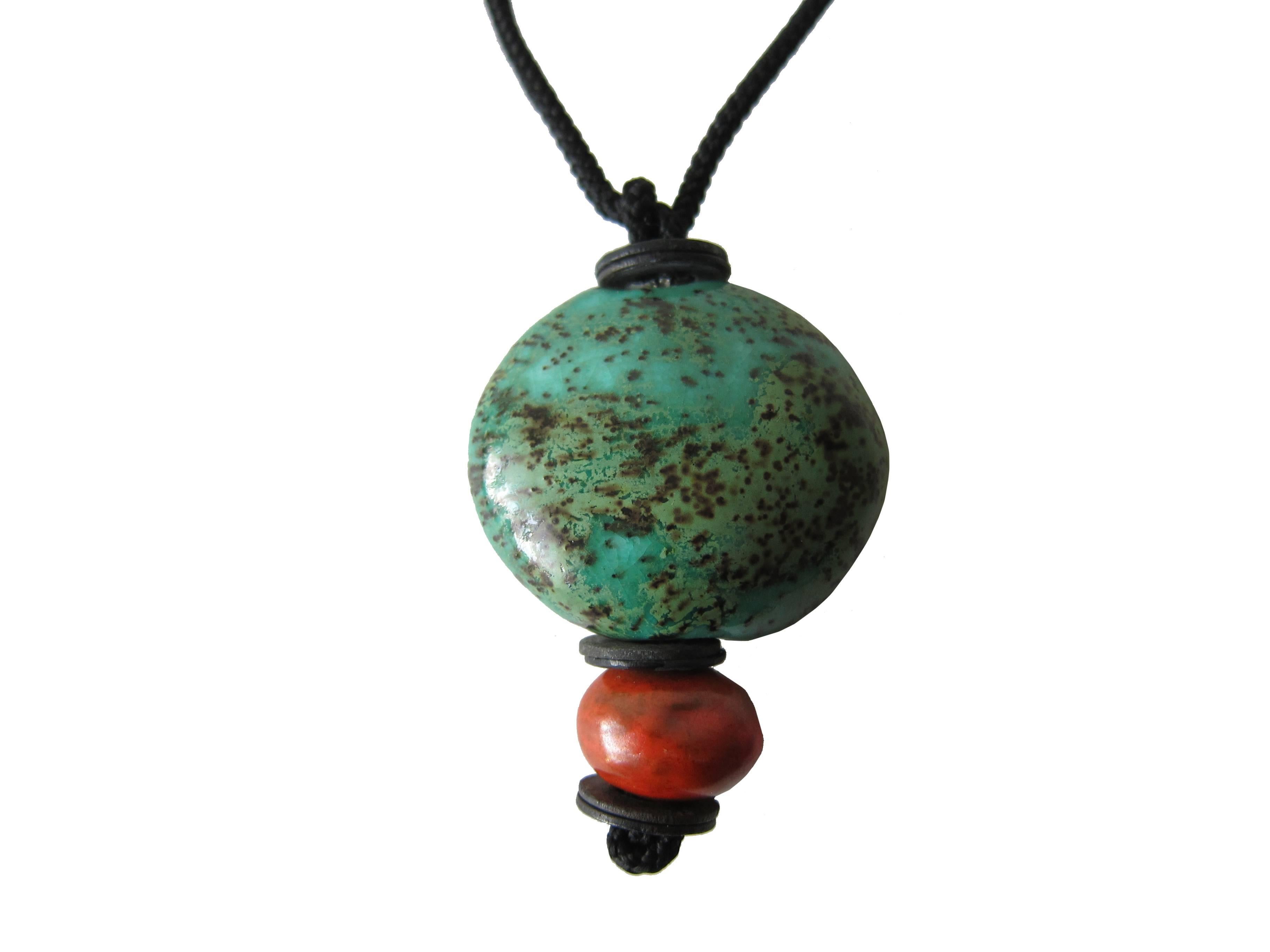 Original, vintage ceramic bead necklace separated by metal washers and knotted rope created by California studio potter Doyle Lane of Los Angeles, California.  Cord measures about 30