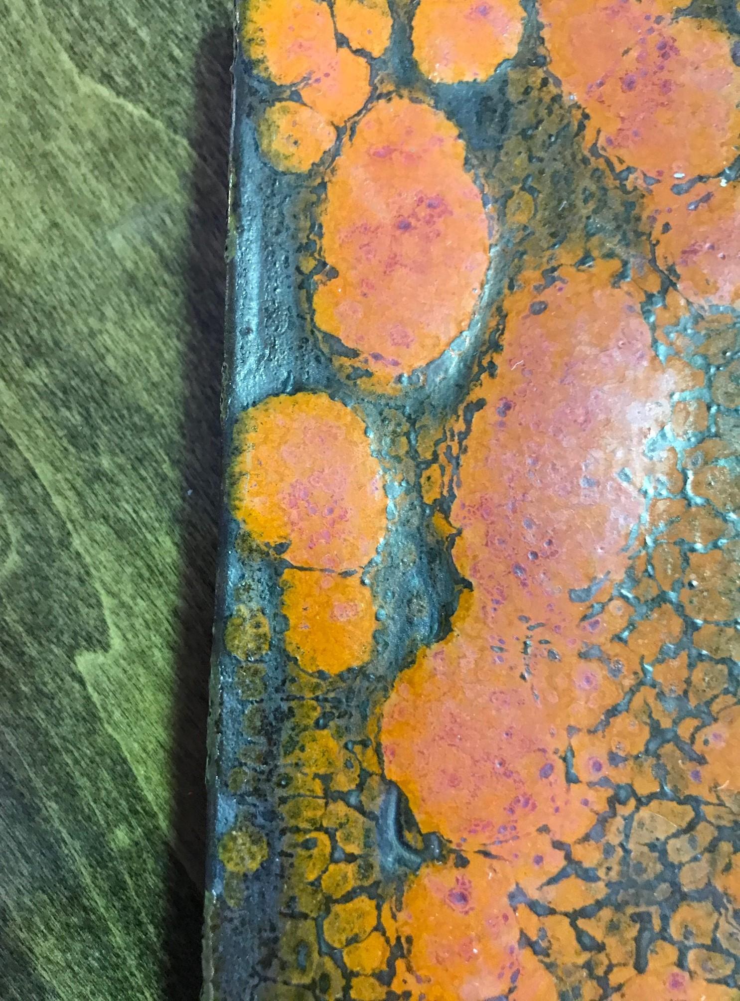 A beautifully glazed and colored ceramic tile by famed midcentury American artist/potter Doyle Lane. Lane was a glaze specialist much like Glen Lukens and Otto Natzler. His colorful glazes would melt, bubble and crack over his pieces creating a very