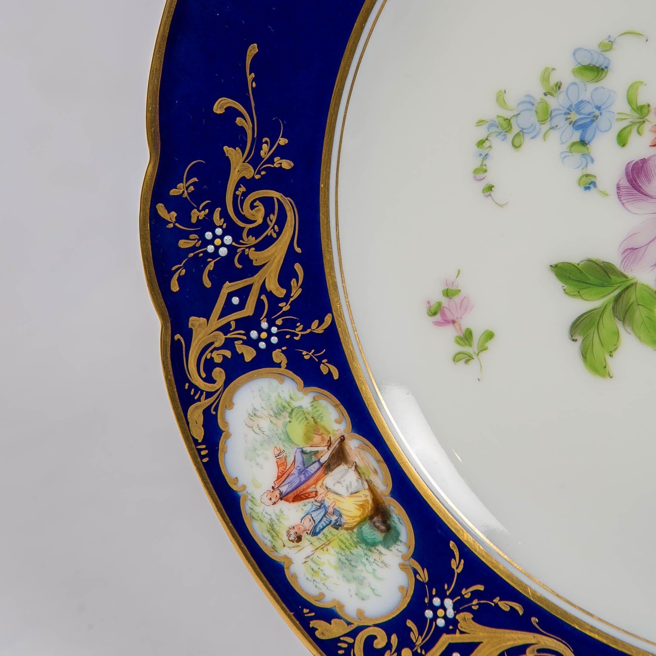 Rococo Revival Dozen Dresden China Dinner Dishes with Flowers and Deep Blue Borders