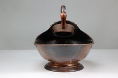 Dr C Dresser Benham & Froud. An Aesthetic Movement brass fire bucket and shovel.