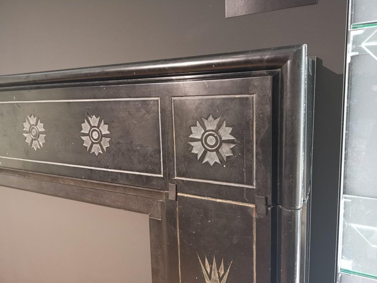 Dr C Dresser. An important and probably unique Aesthetic movement black marble fire surround, with stylized bull rushes and floral incised gilded details. The incised bull rushes decoration conforms to an ebonized and gilded wardrobe Circa 1874,