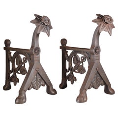 Dr C Dresser (style of). A pair of Arts and Crafts Cast Iron Fire Dogs