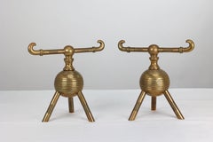 Dr Christopher Dresser for Benham and Froud. A pair of brass fire dogs