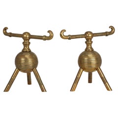 Dr Christopher Dresser for Benham and Froud. A pair of brass fire dogs
