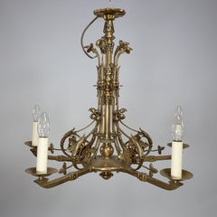 Dr Christopher Dresser (manner). An Aesthetic Movement brass five arm chandelier