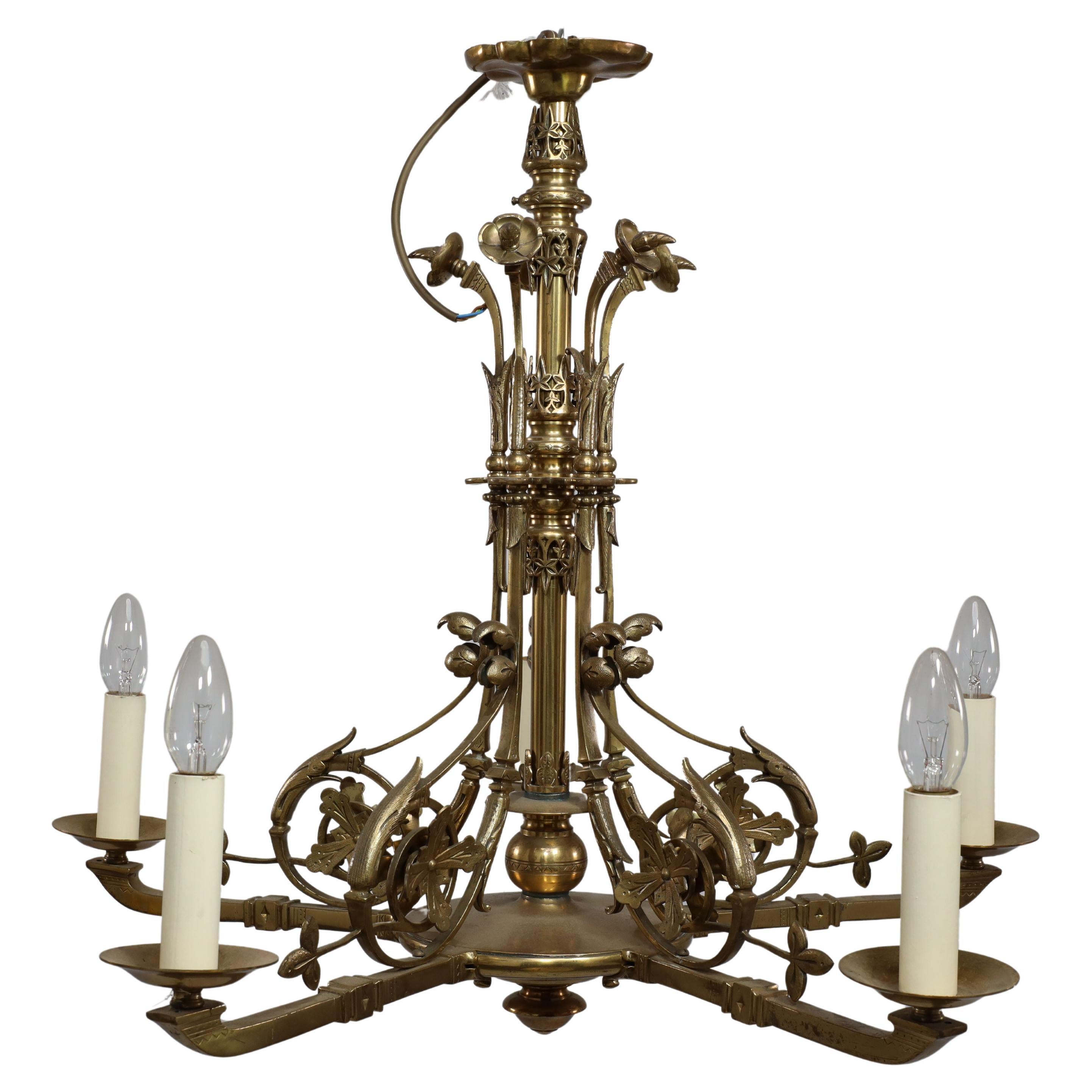 Dr Christopher Dresser (manner). An Aesthetic Movement brass five arm chandelier