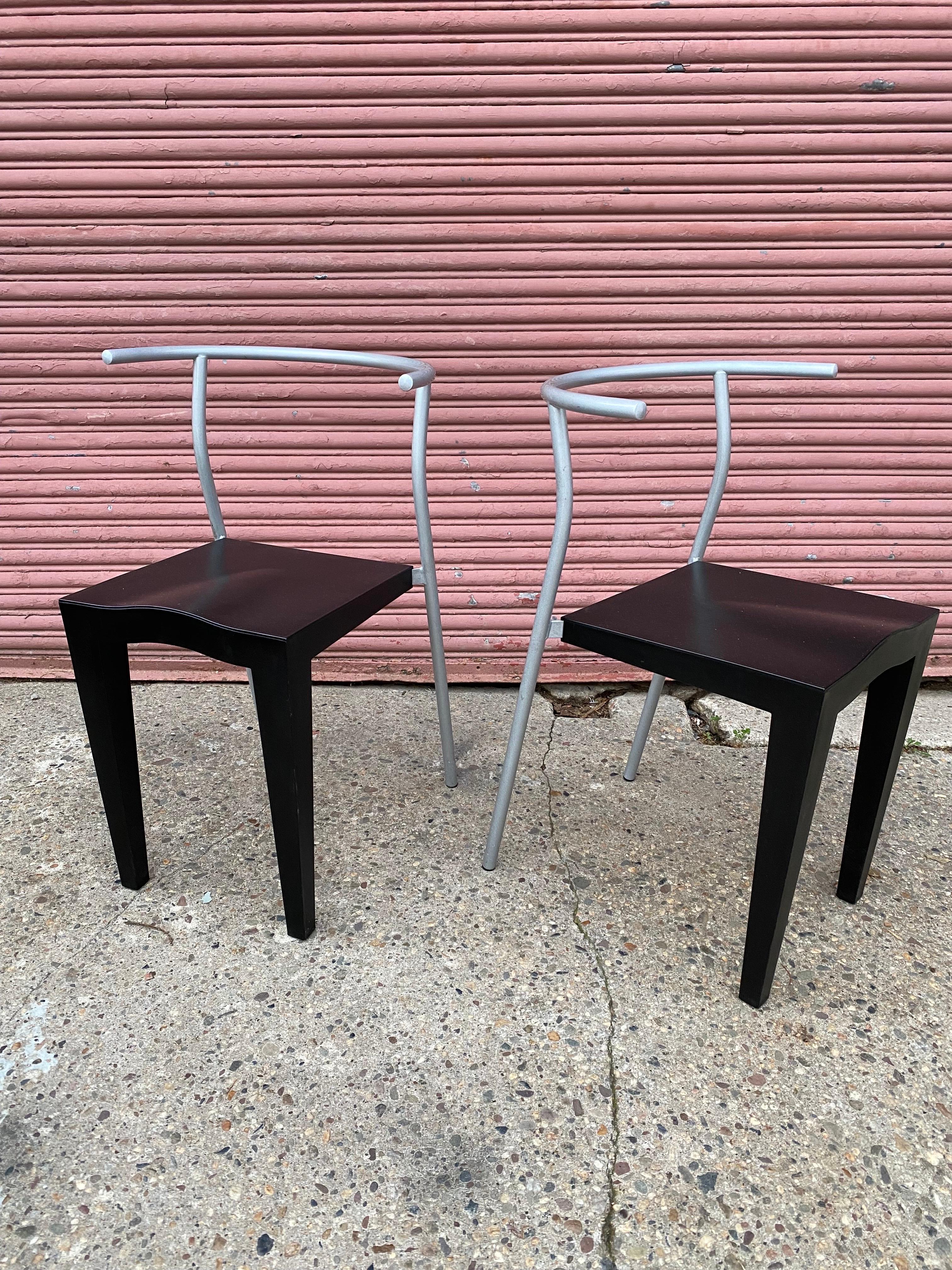Pair of Dr. Glob chairs designed by Philippe Starck for Kartell. Chairs are black with metal silver backs. Designed in the 1990's. In nice Original Condition!.