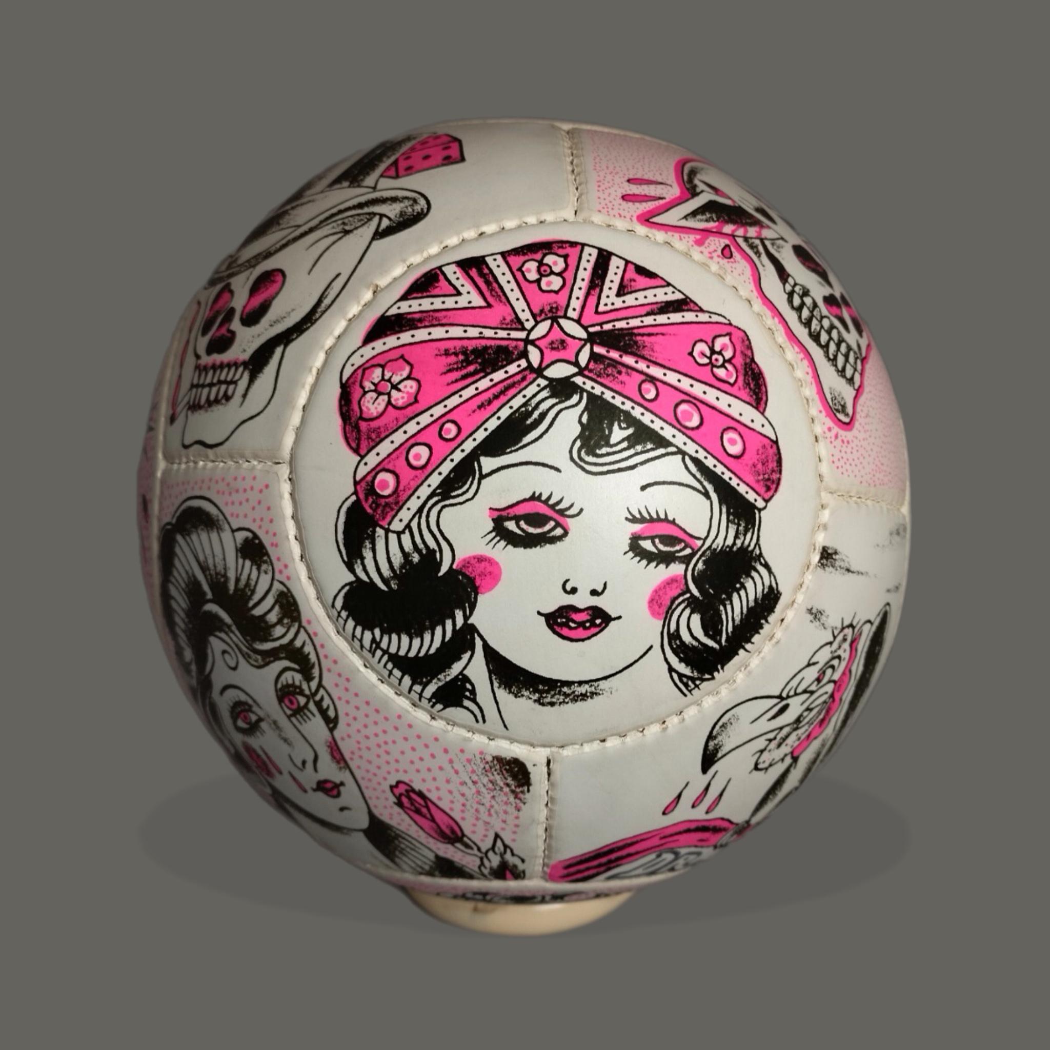 A synthetic leather soccer ball with silkscreen prints by Jerónimo López Ramírez 