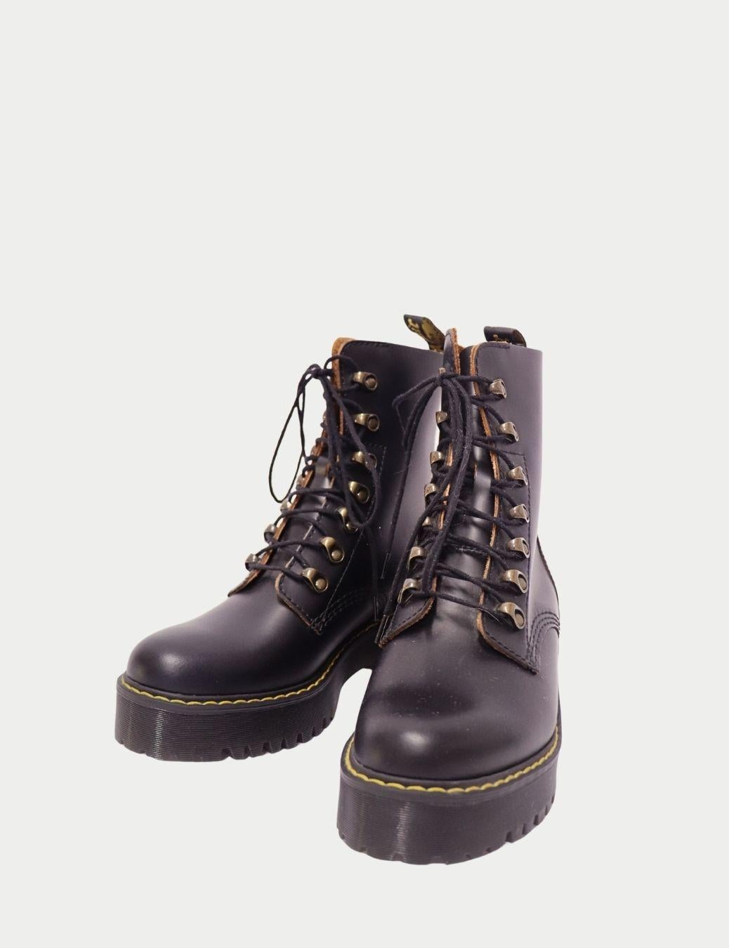 Noir Dr. Martens Bottes de combat à plateforme en cuir noir - EU 39 en vente