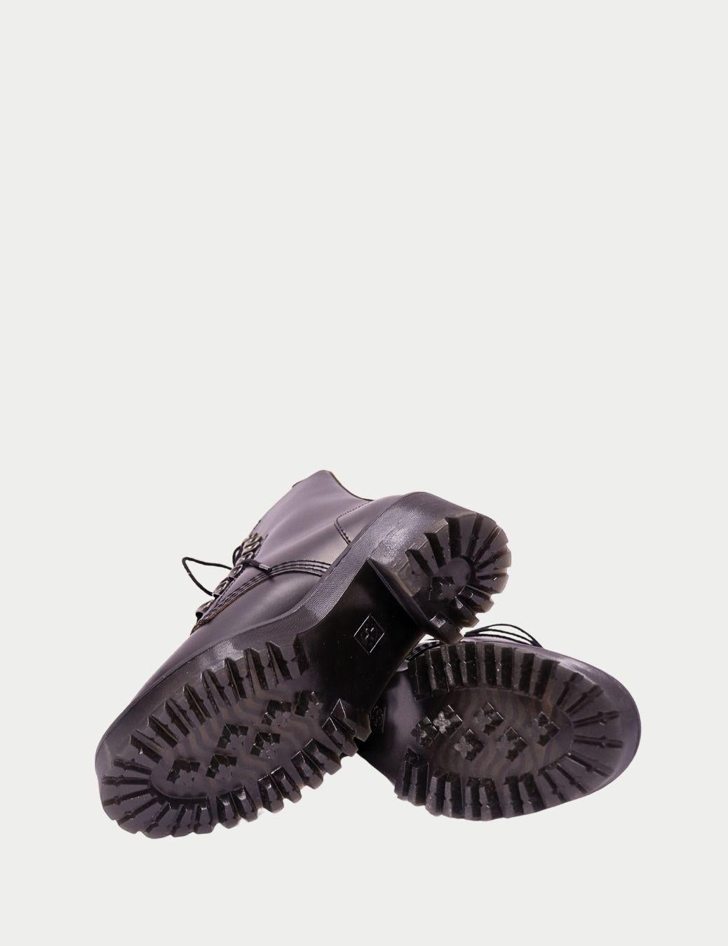 Dr. Martens Bottes de combat à plateforme en cuir noir - EU 39 Neuf - En vente à Amman, JO