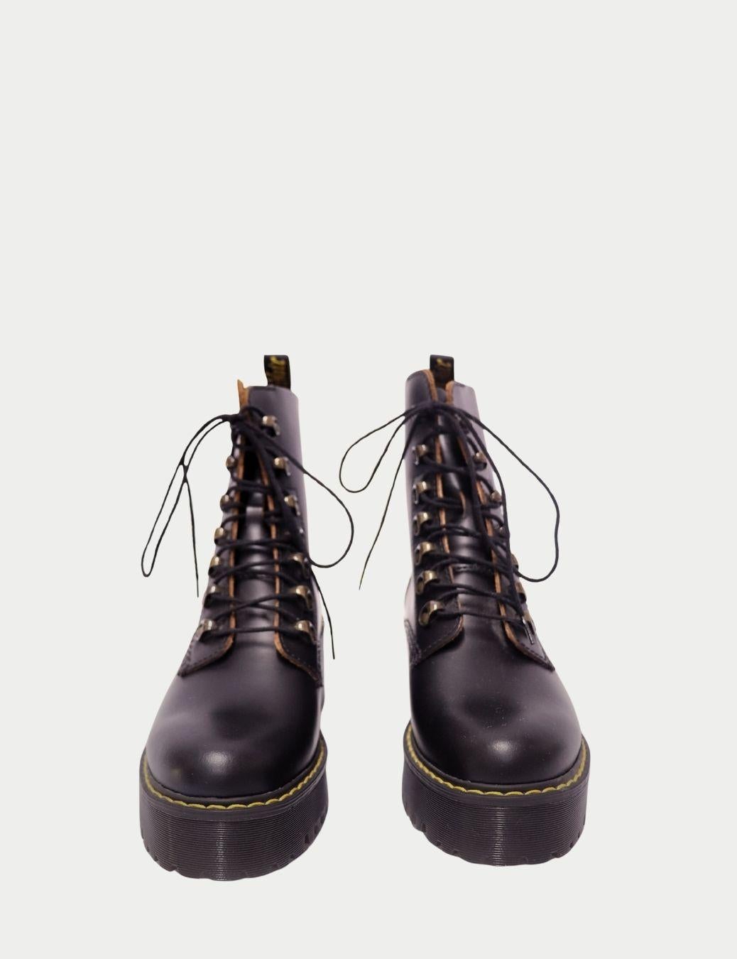 Dr. Martens Bottes de combat à plateforme en cuir noir - EU 39 Pour femmes en vente