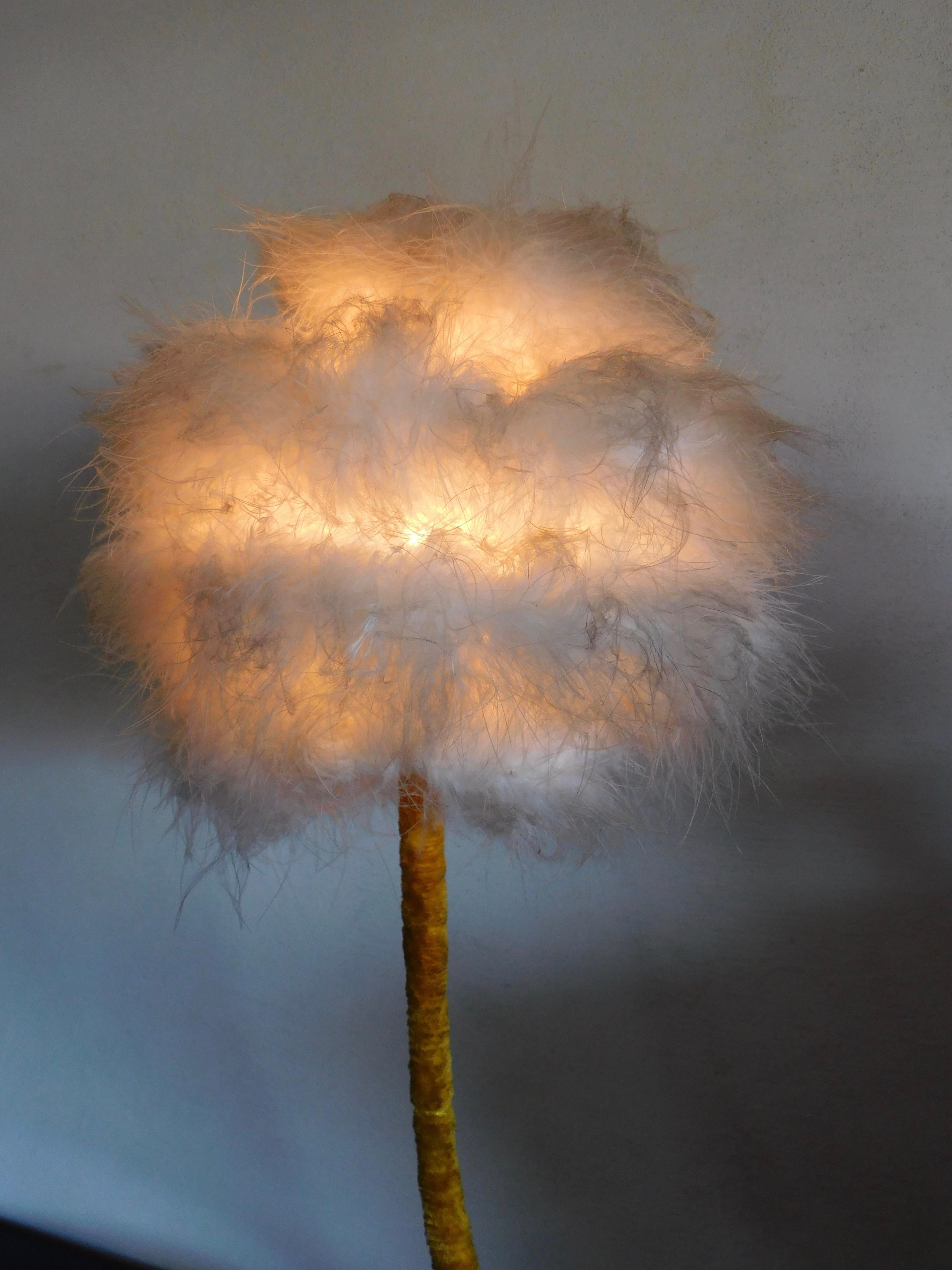 Weird and wonderful 1970s, French marabou feather and velvet table lamp.
  