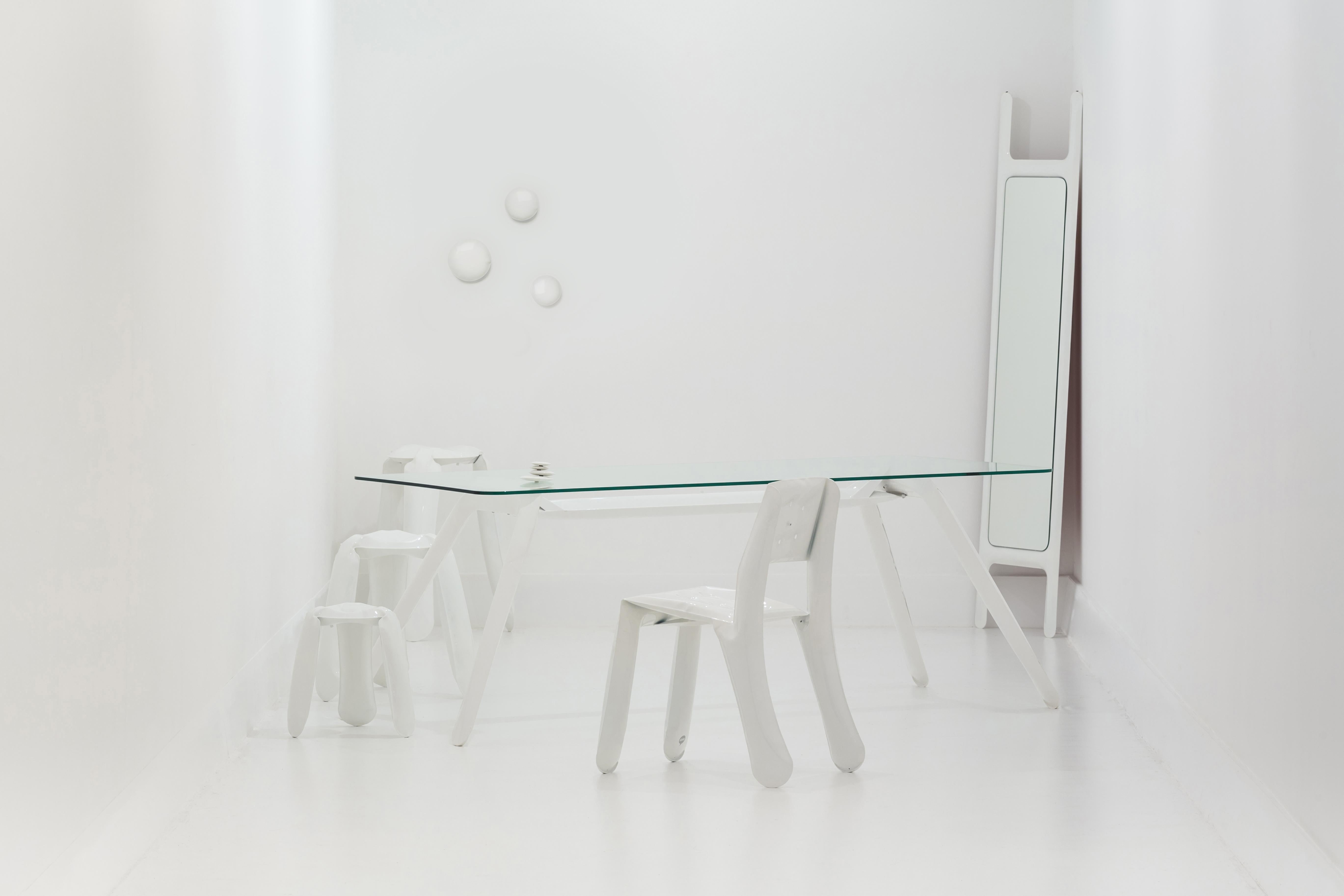 Drab mirror is a part of a drab ladder family, adding a new function to an elegant frame created with the use of FiDU technology. The inflation effect is not so obvious, yet it is well highlighted in the convexity of this simple form.

Available