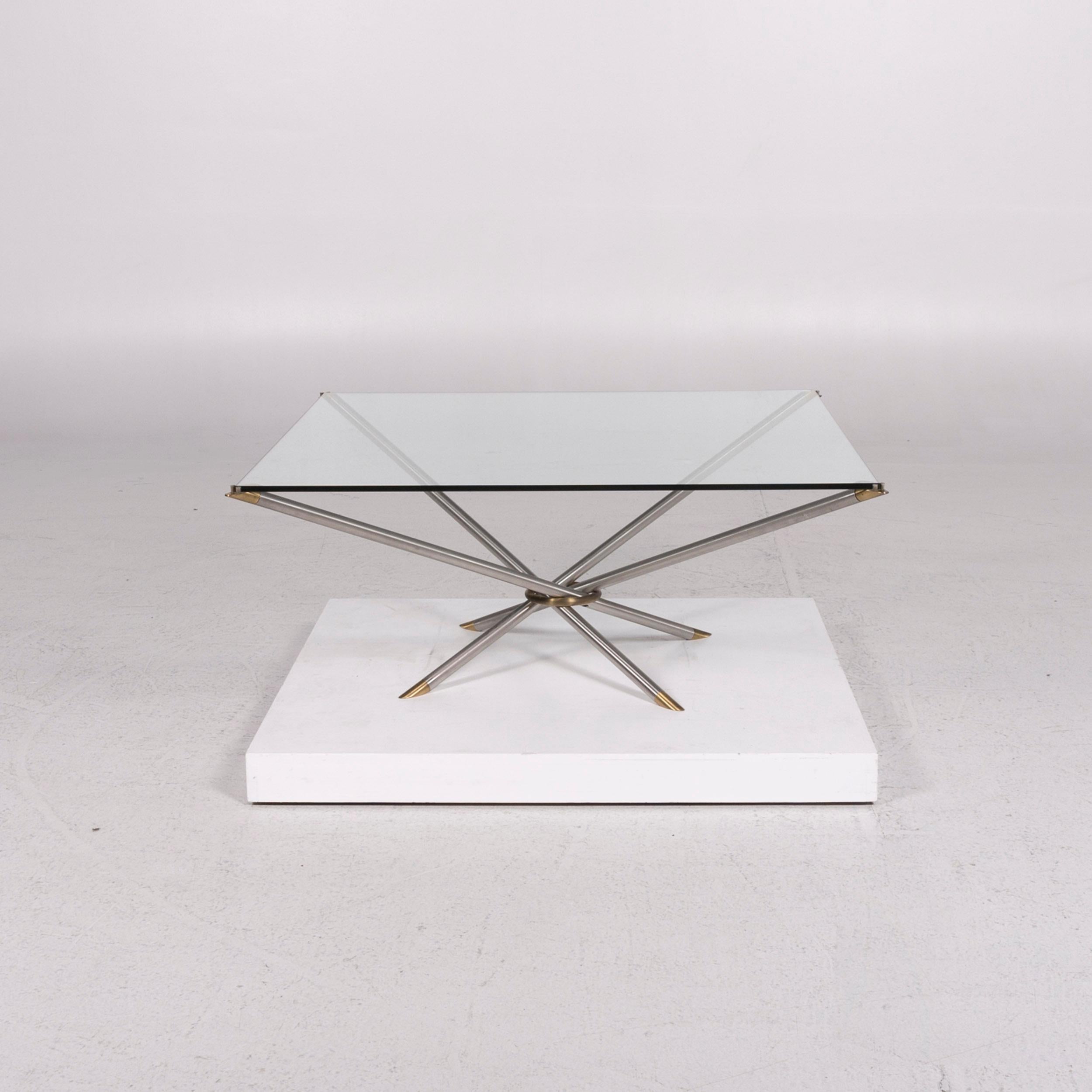 We bring to you a Draenert glass coffee table aluminum brass table square.


 Product measurements in centimeters:
 

Depth 100
Width 100
Height 42.





 