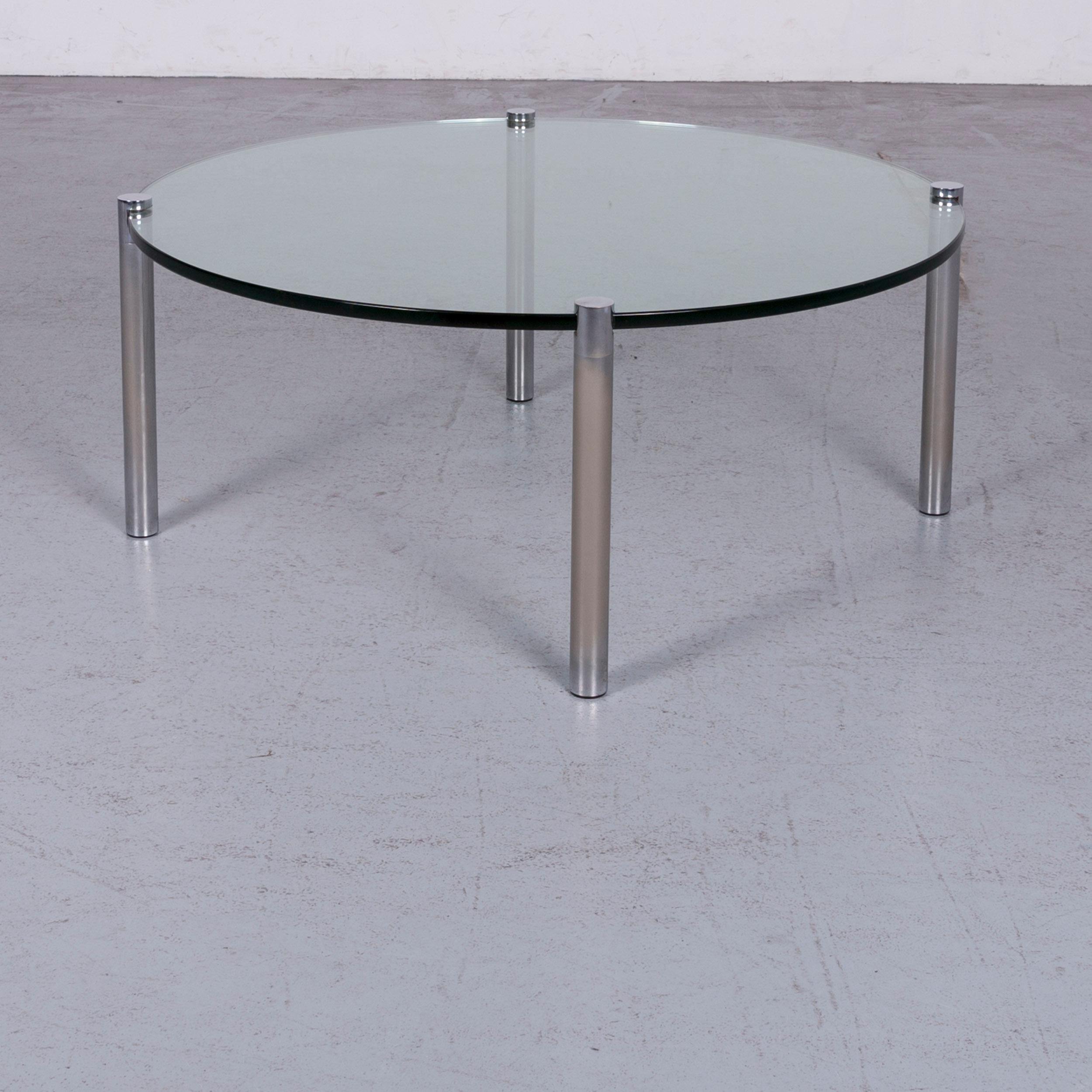We bring to you a Draenert Klassik 1022 designer coffee table glass chrome.
































