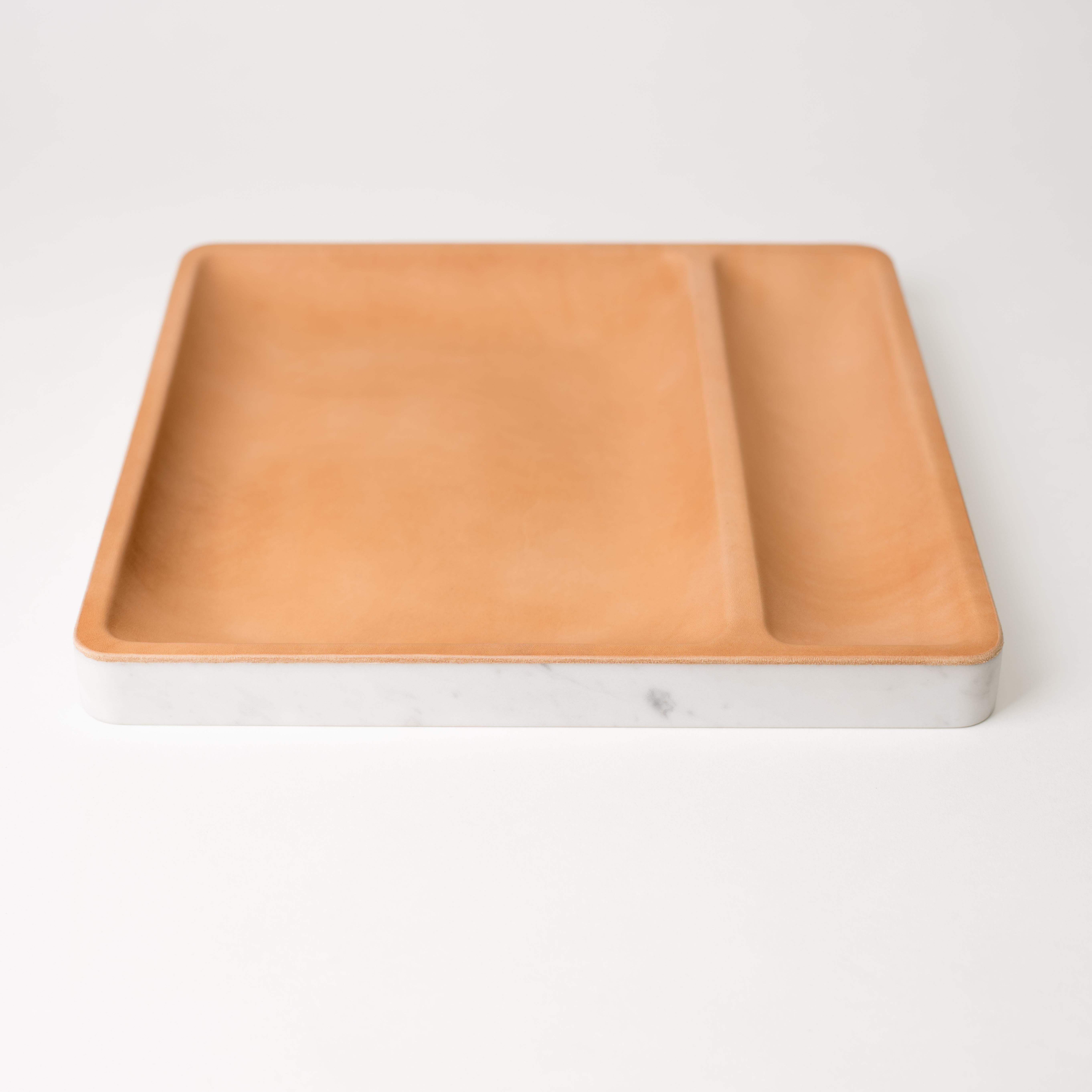 Modern combination of luxurious materials to contain the precious items you covet. Elevate your daily rituals with a place to hold and organize the items you carry every day. The Carrara Marble base is waterjet cutout of single piece. To maximize