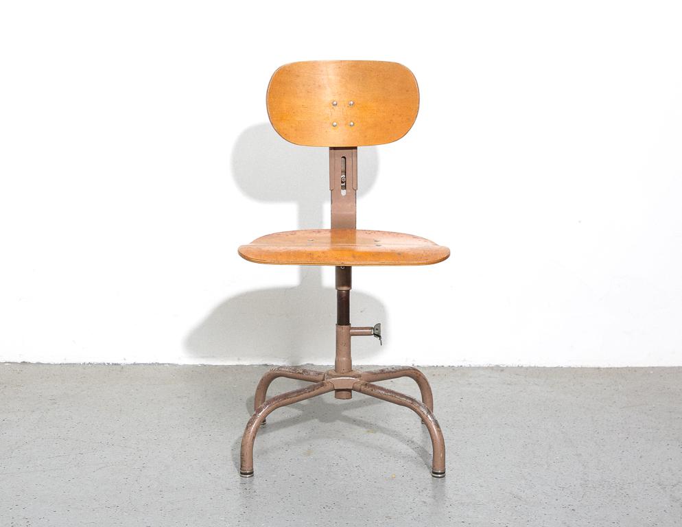 Mid-century architectural drafting stool by Harco for Garrett Tubular products. Height adjustable bentwood backrest & seat, steel frame and post construction. 20.5