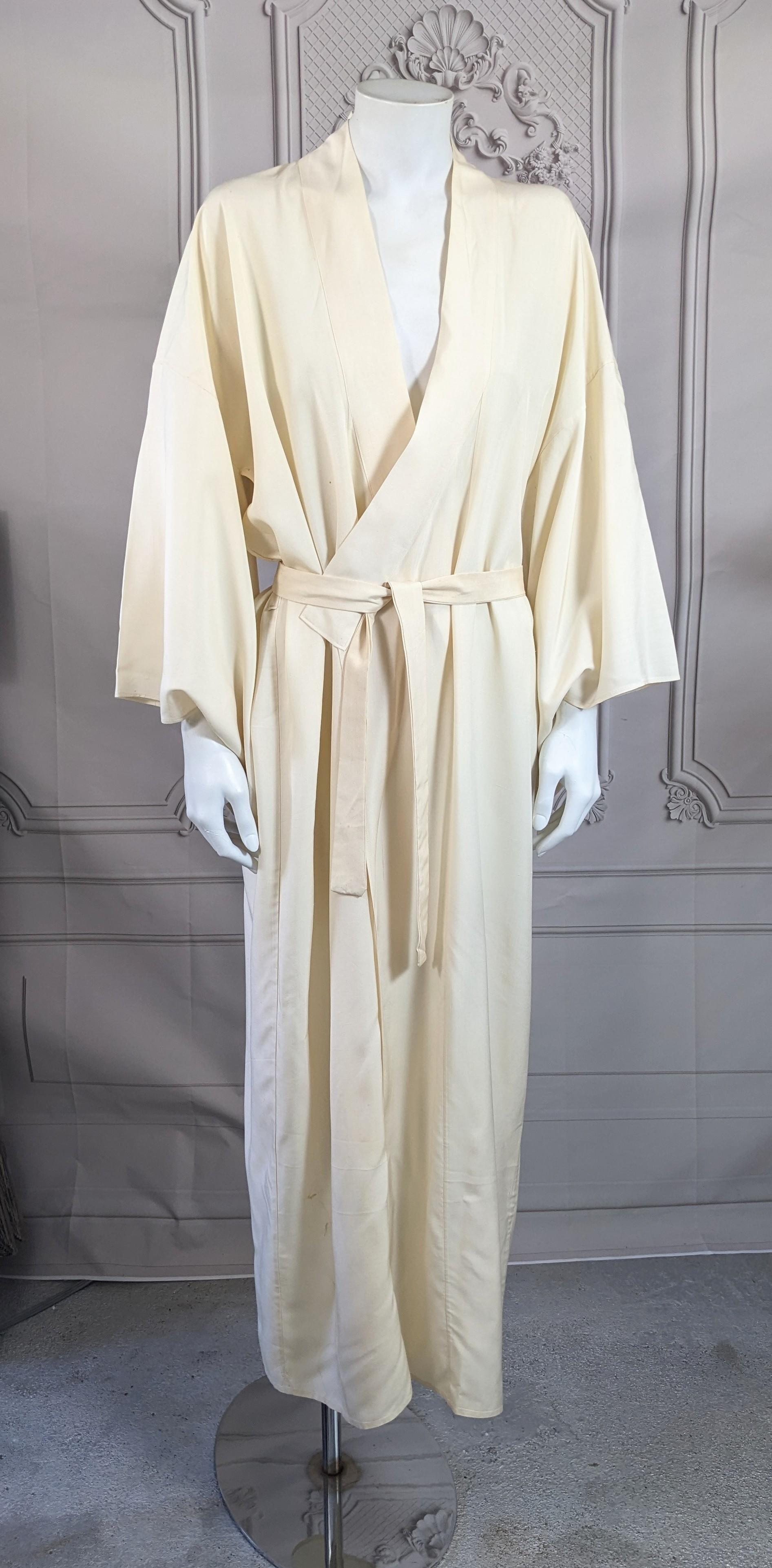 Mid Century Dragon Embroidered Kimono in ivory silk broadcloth with elaborately hand embroidered blue silk ombre on back. 
Self belt. 1940's. 