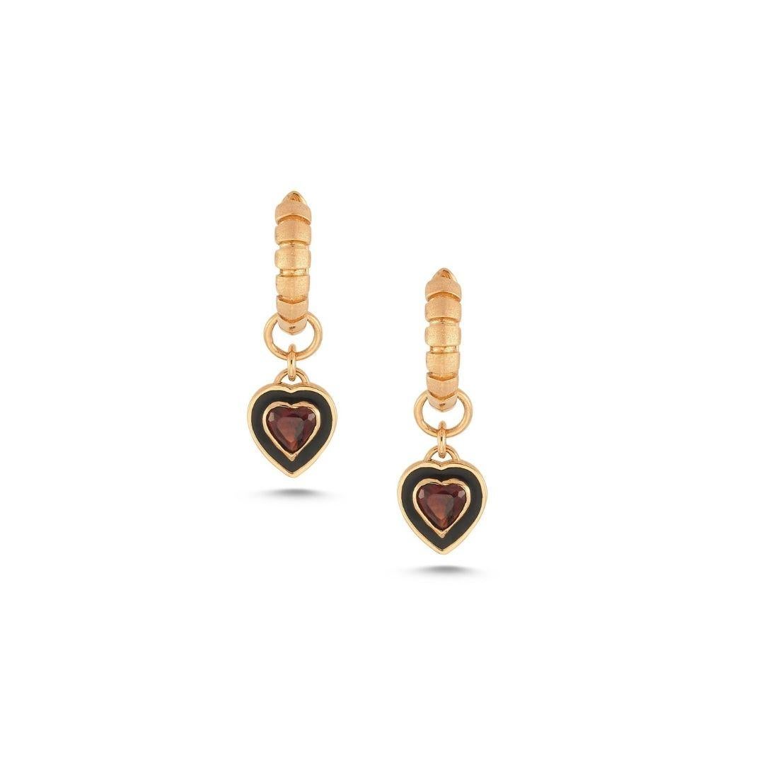 Dragon heart earring (single) with garnet and black enamel by Selda Jewellery

Additional Information:-
Collection: Dragon Lady Collection
14k Rose gold
0.28ct Garnet
Black enamel