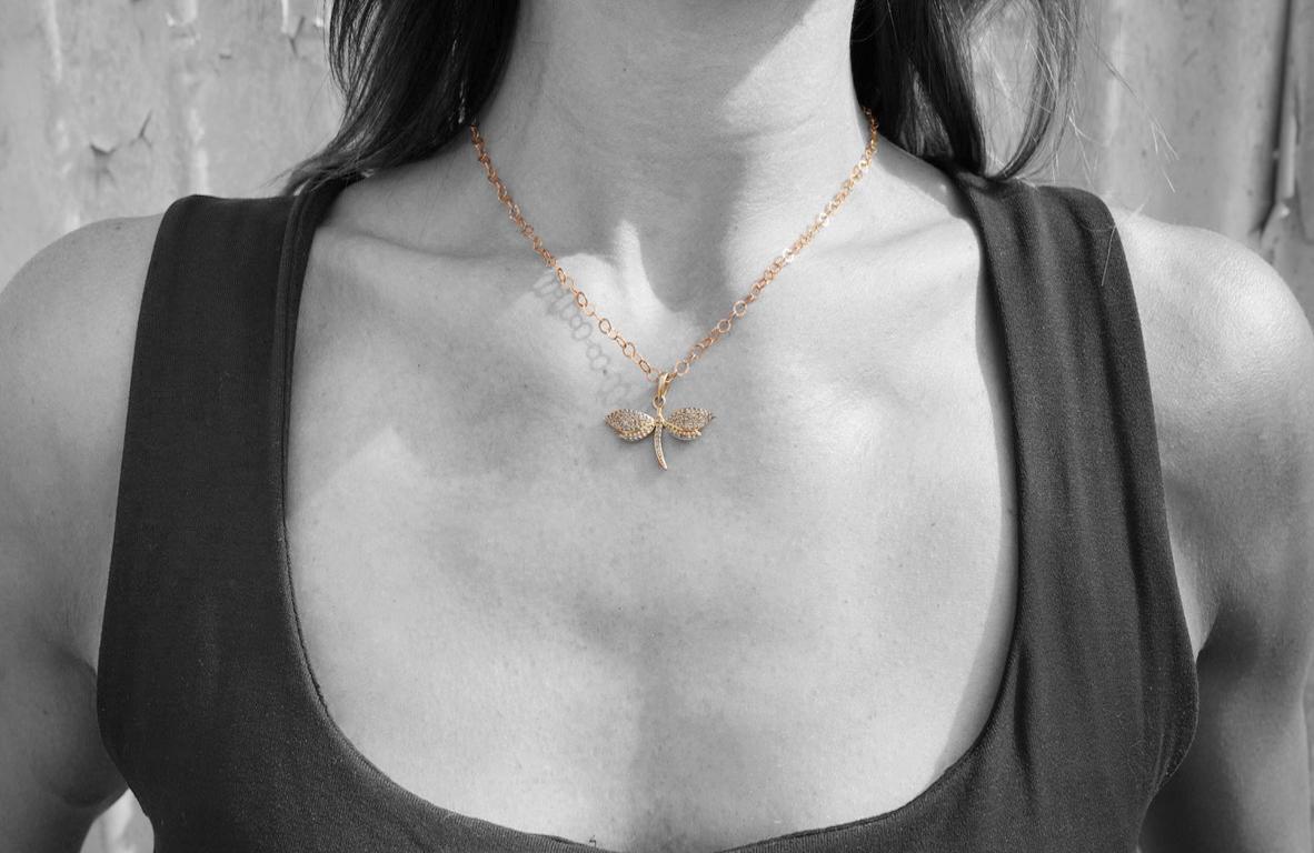 Story Behind the Jewelry
In celebration of new beginnings, the Dragon Love necklace is adorned with a delicate pave diamond dragonfly set in 14K gold.  The pendant is draped on a 14K gold necklace that is accented with sea-foam turquoise to