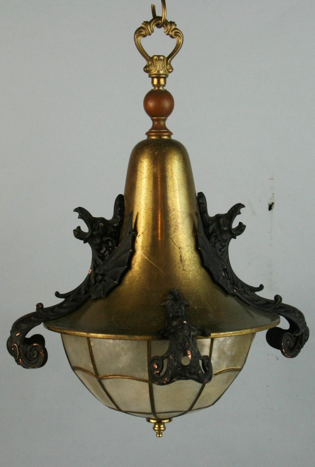 3-788 Antique brass pendant with copper dragon figures with latter added capiz shell shade
Takes 2 60 watt Edison based bulbs
Supplied with 2 feet chain and canopy
Fixture dimensions 17 