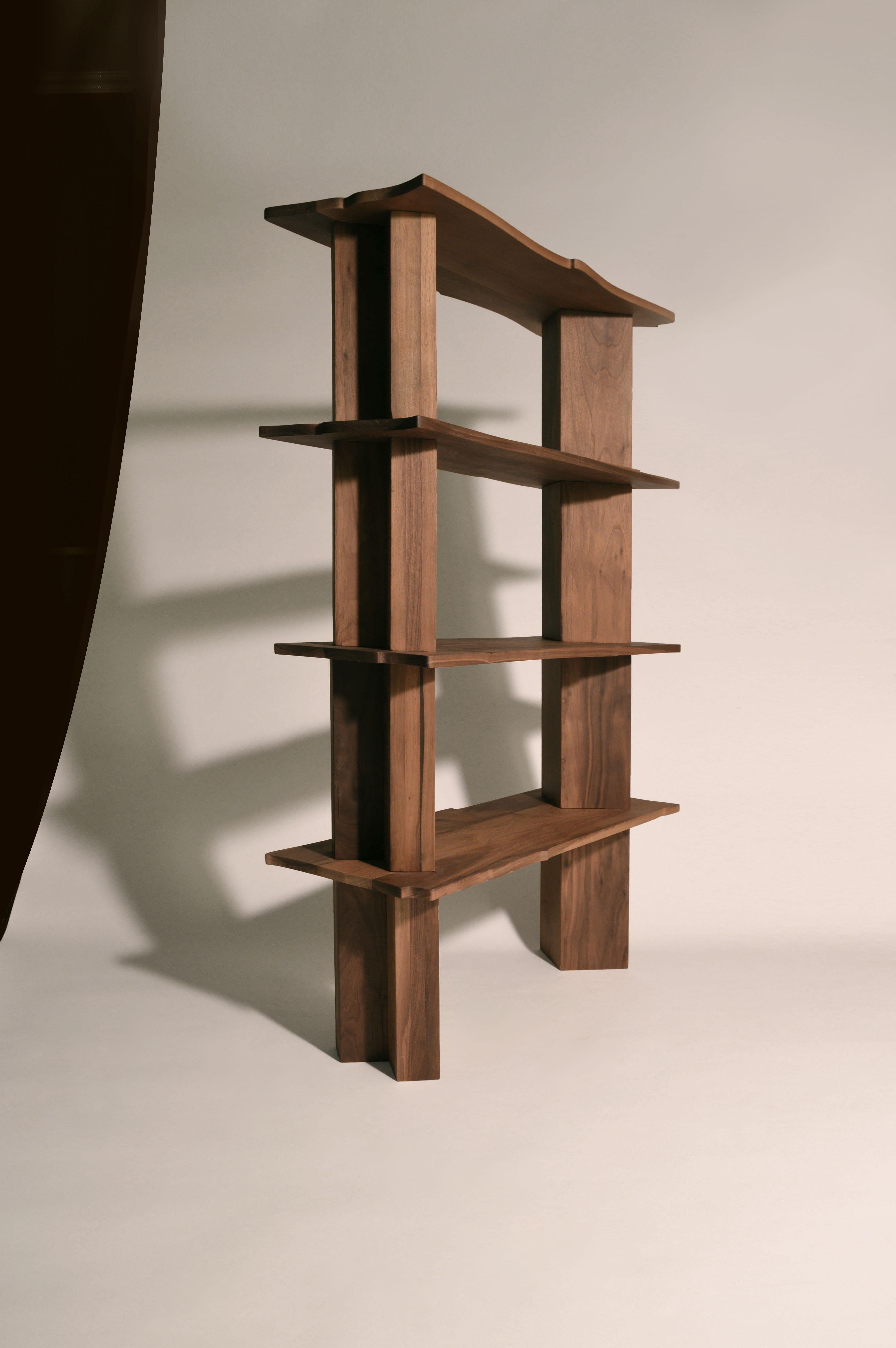 Dragon Shelf is a shelf-unit that is entirely crafted from massive black walnut (Noce Canaletto). This object can be used as a display unit for collectibles or as a bookshelf.
Each horizontal surface has a unique design that is a result of