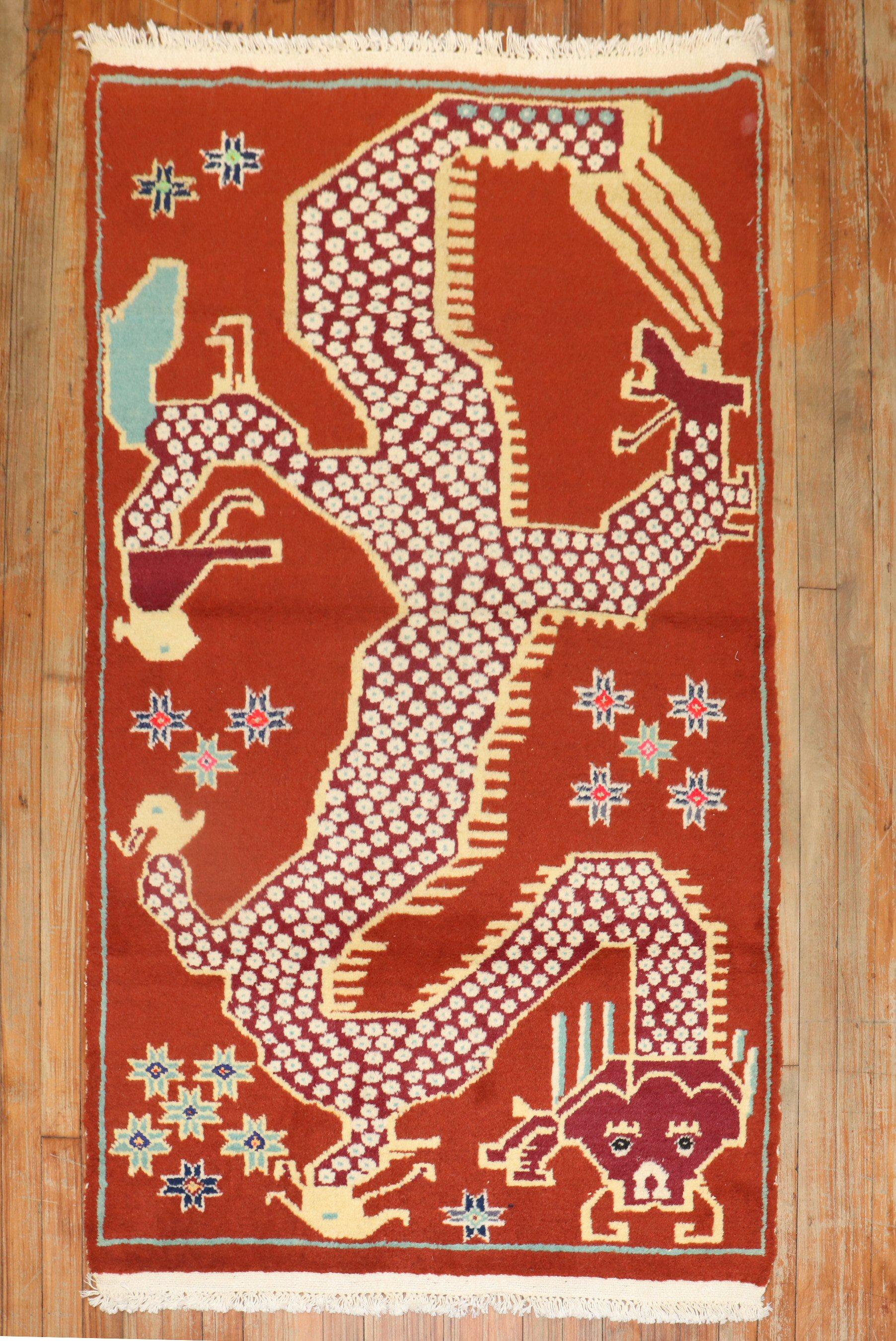 Colorful one-of-a-kind Tibetan rug from the 3rd quarter of the 20th century with a dragon motif

Measures: 3'4'' x 5'7''.