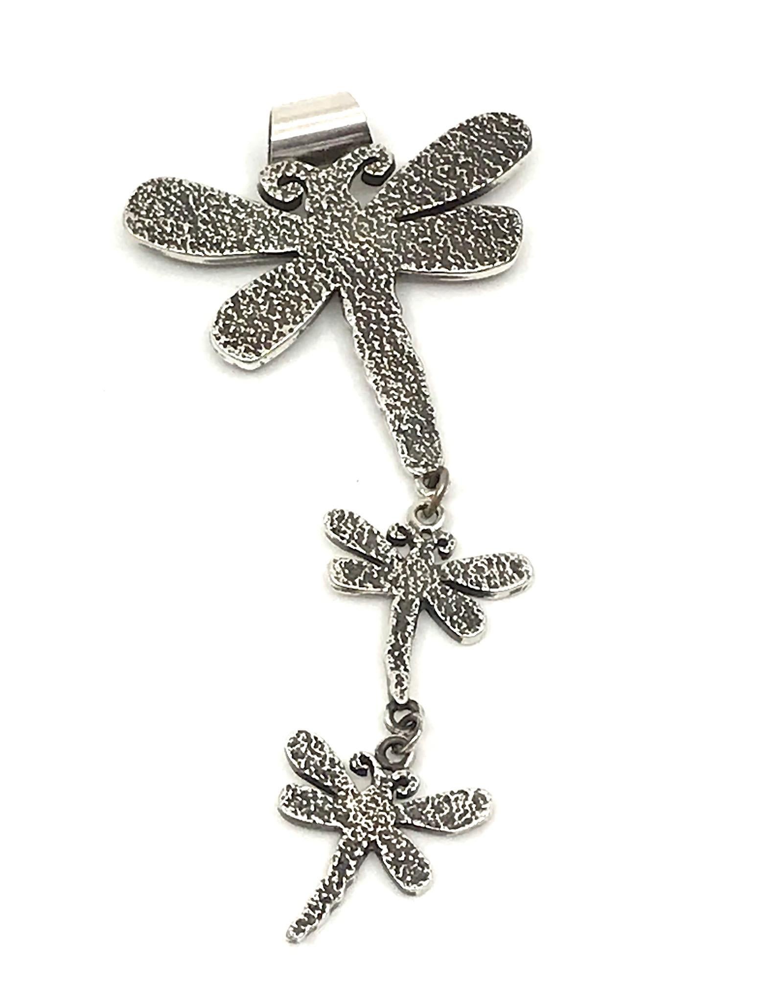 Dragonfly Drop Necklace, Melanie Yazzie cast silver drop pendant  Navajo designs

Dragonfly Drop Necklace, cast silver pendant Melanie Yazzie Navajo

Wearable art jewelry designs by internationally known printmaker, sculptor, and painter. 

Cast and