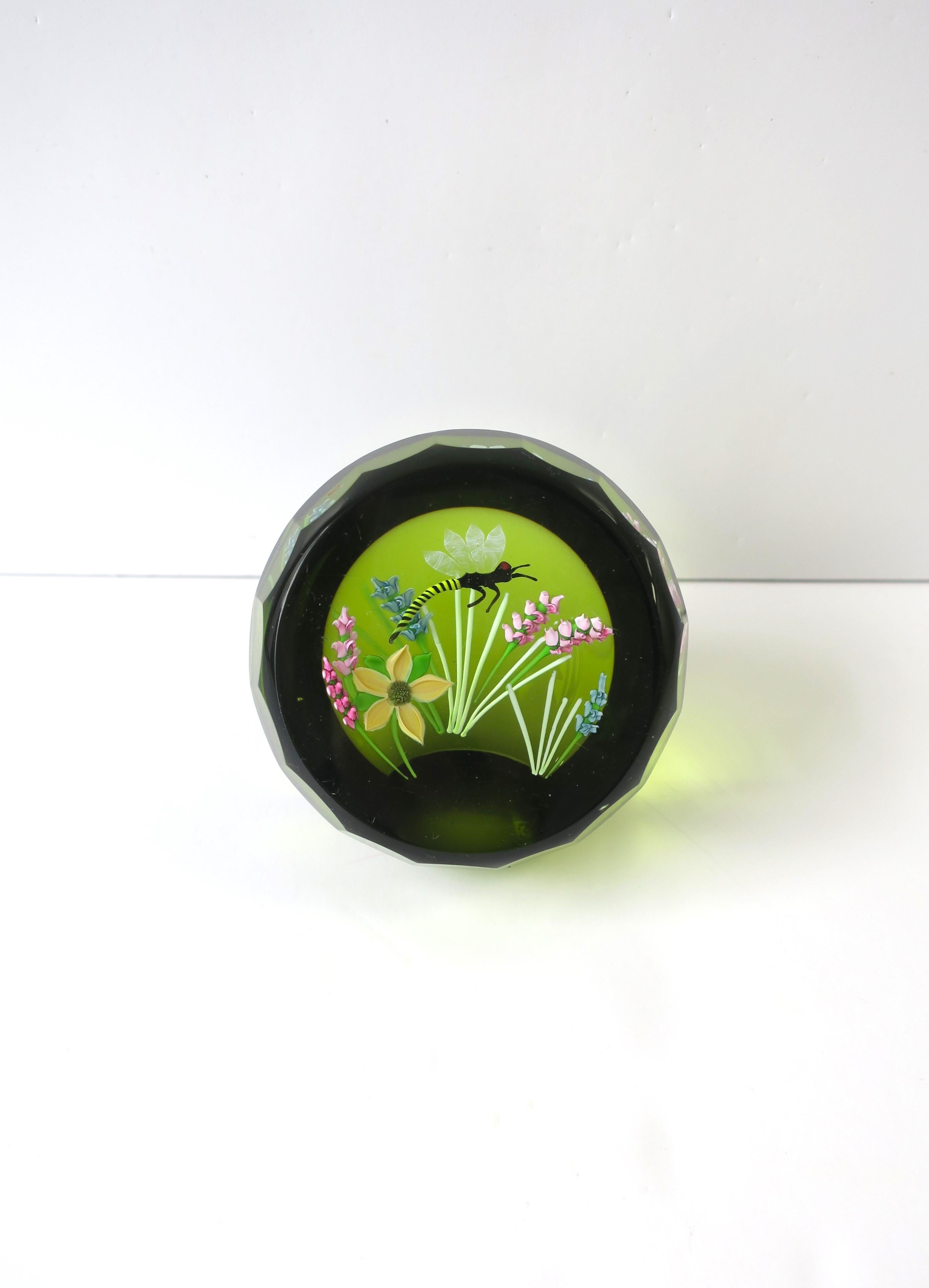 A beautiful, handcrafted Scottish studio art glass 'Dragonfly' garden paperweight decorative object, made in Scotland, circa late-20th century. A beautiful piece, a traveling garden if you will, with detailed dragonfly and flowers. A decorative