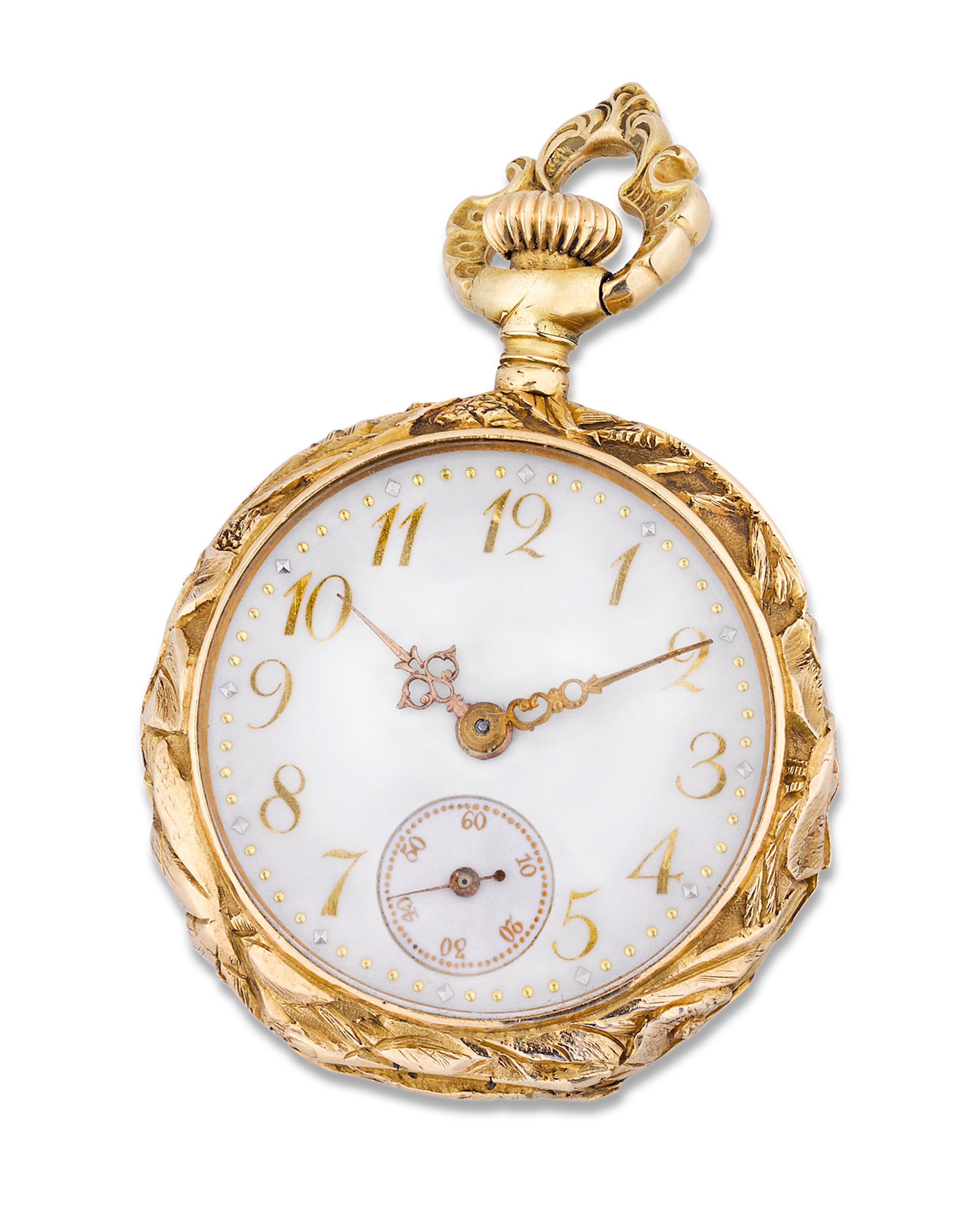 The highly respected E. Jaccard Jewelry Co. of St. Louis created this masterfully crafted lapel watch. The hand-wrought case is made of 18K yellow gold and features two hinged segments, the first of which showcases the masterfully pierced and