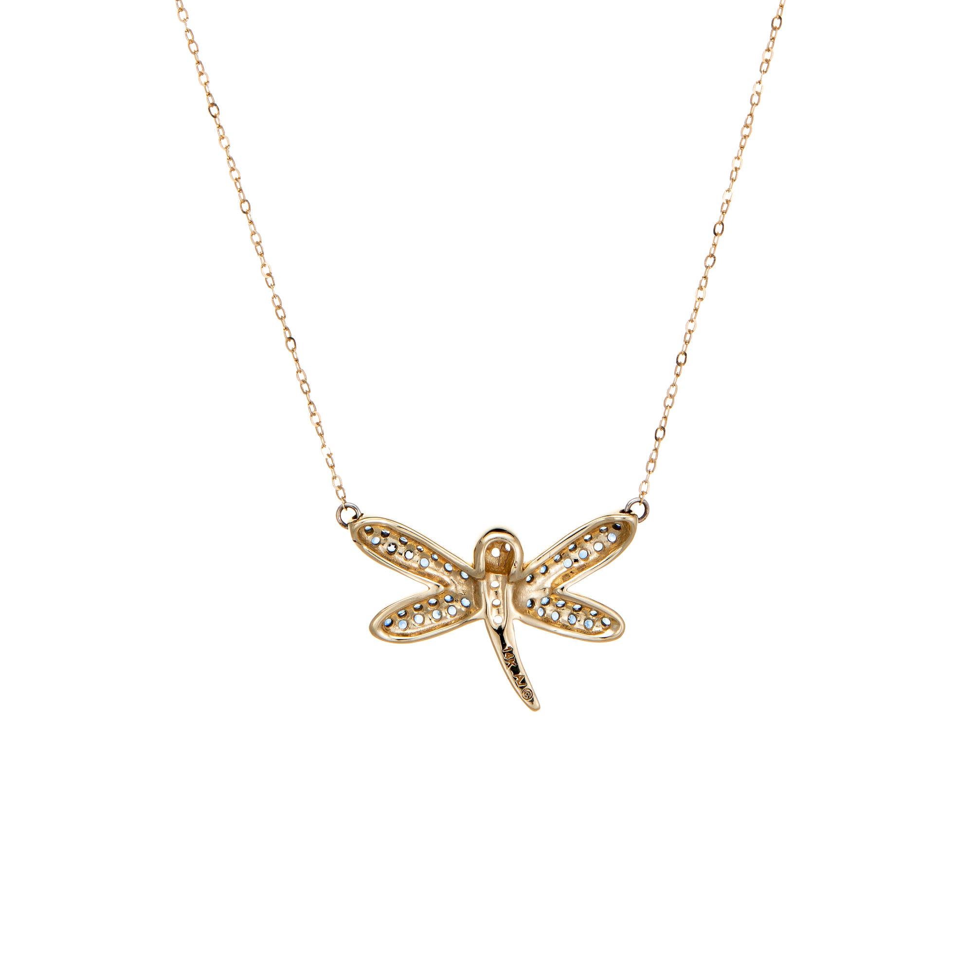 Stylish and finely detailed dragonfly sapphire & diamond necklace crafted in 14 karat yellow gold.

Diamonds total an estimated 0.10 carats (estimated at G-H color and VS2-SI1 clarity). The sapphires total an estimated 0.25 carats. 

The dragonfly