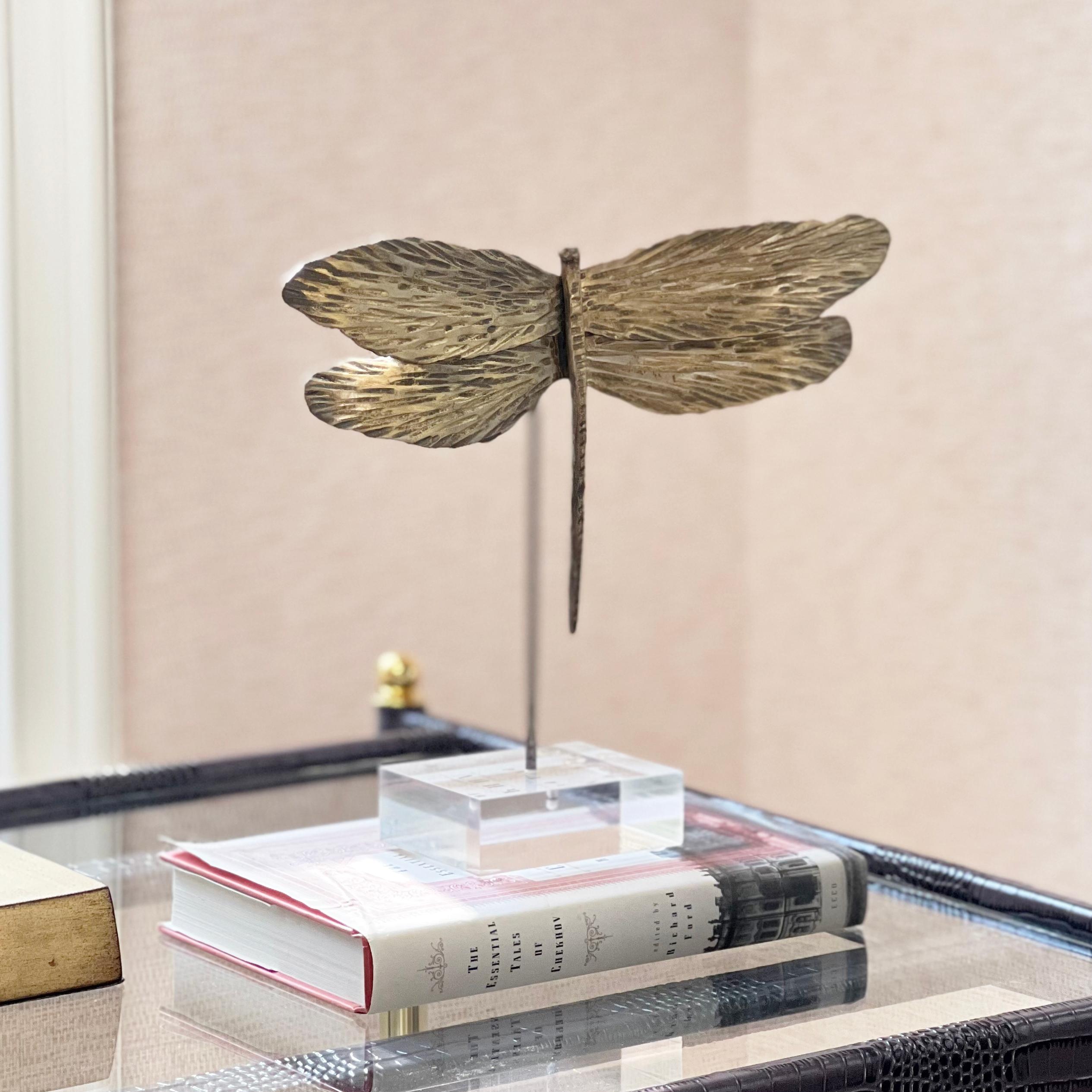 Mix it up. With gilded wings textured by hand, this dragonfly accessory makes a spot more playful. Orchestrate your space with things like natural motifs that you smile.
