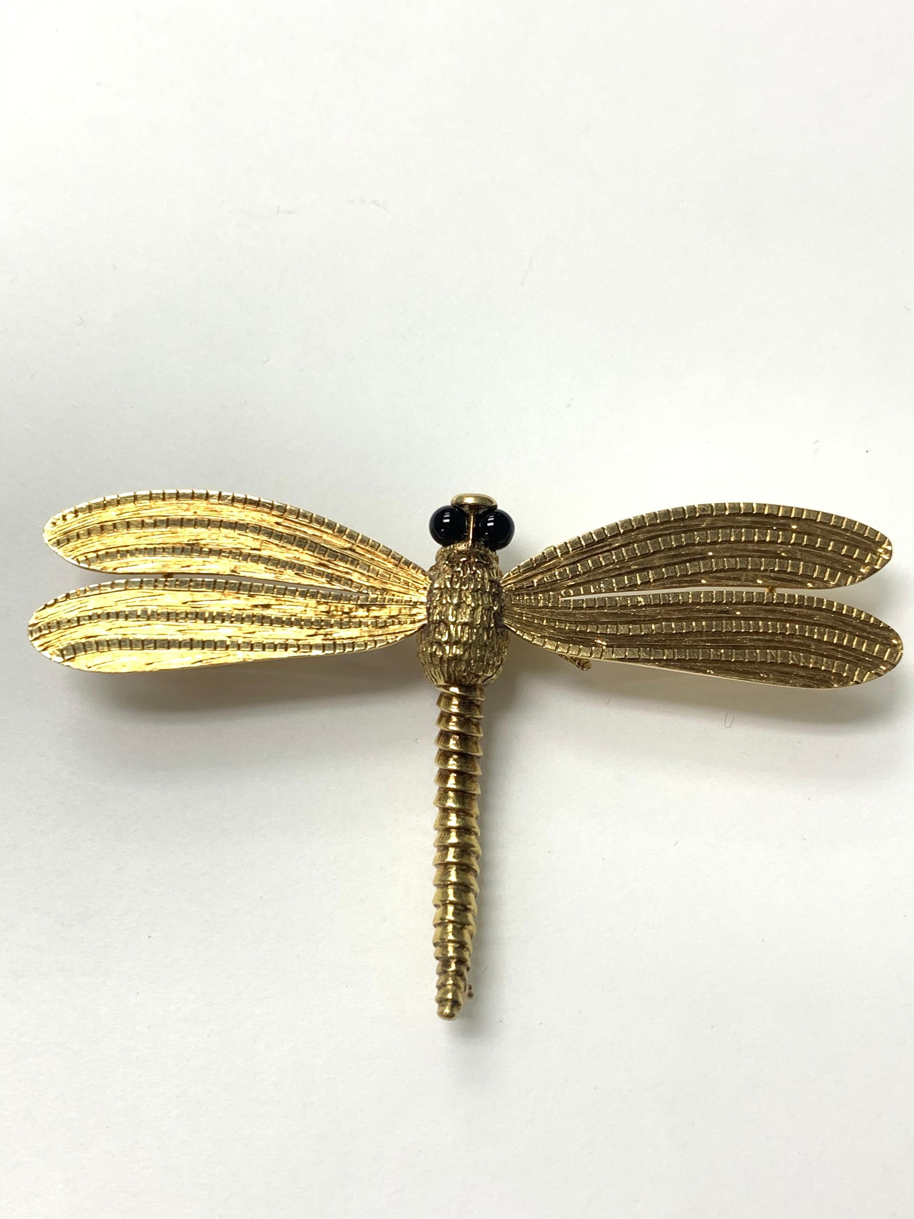 Dragonfly onyx and 18 K Yellow gold Pin. 
Gold Weight : 
Measurements: 2 inches by 3 inches 
Gold weight: 20.5 grams 