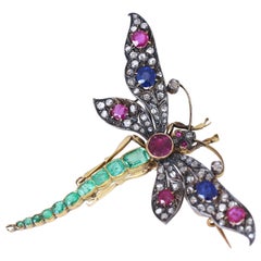 Spilla con ciondolo a forma di libellula Rubie Smeraldi Diamanti Rivista in oro, 1900