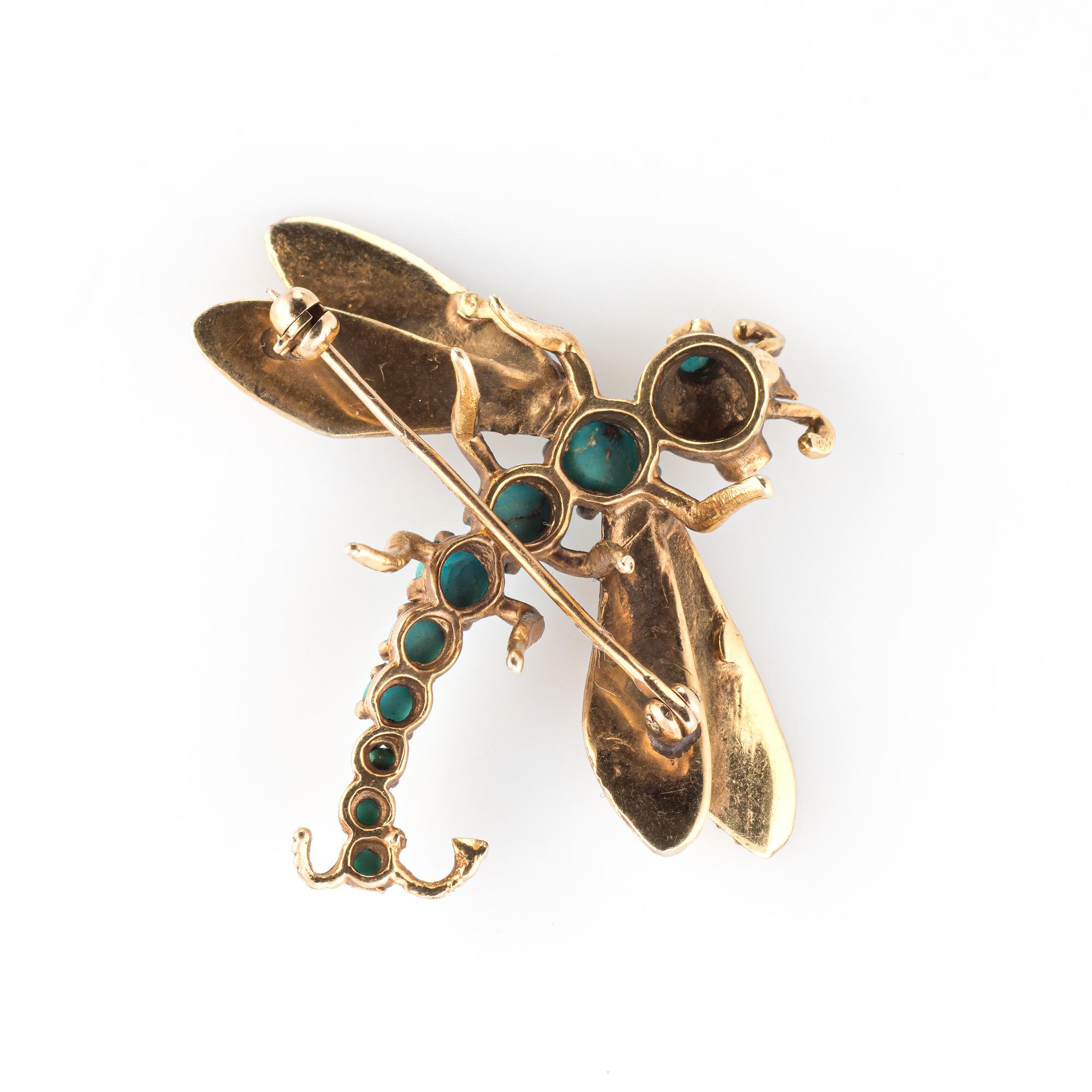 Finely detailed turquoise dragonfly brooch crafted in 14 karat yellow gold (circa 1960s).  

Egg shell blue Turquoise graduates in size from 2mm to 5mm.     

The dragonfly symbolizes change, transformation and adaptability. The dragonfly is great
