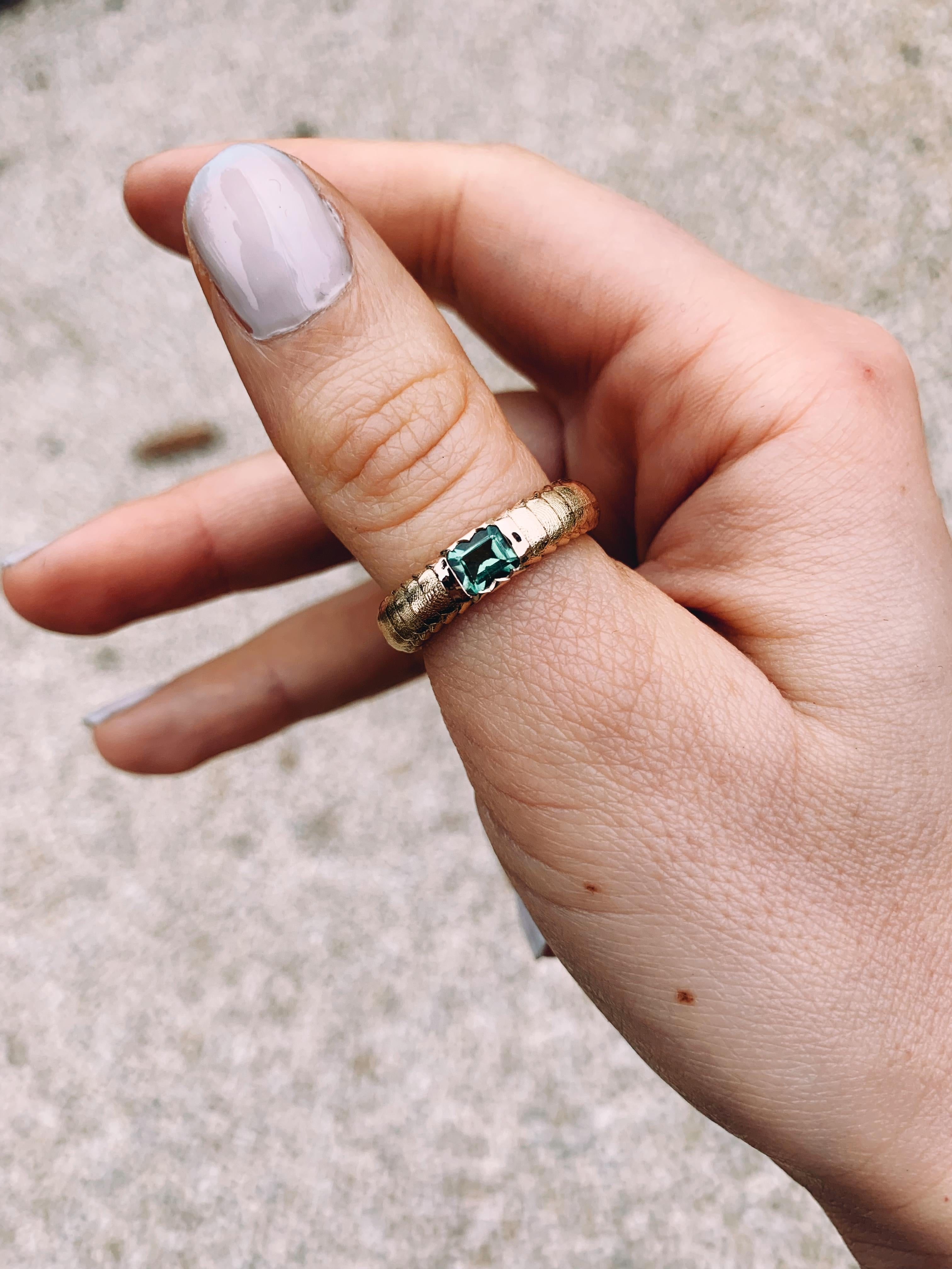 Dragons have always been associated with strength and loyalty, so this ring is meant to inspire you and give you confidence.

Made of 18ct recycled gold with ethically mined zircon from Madagascar.

This item is one-of-a-kind.