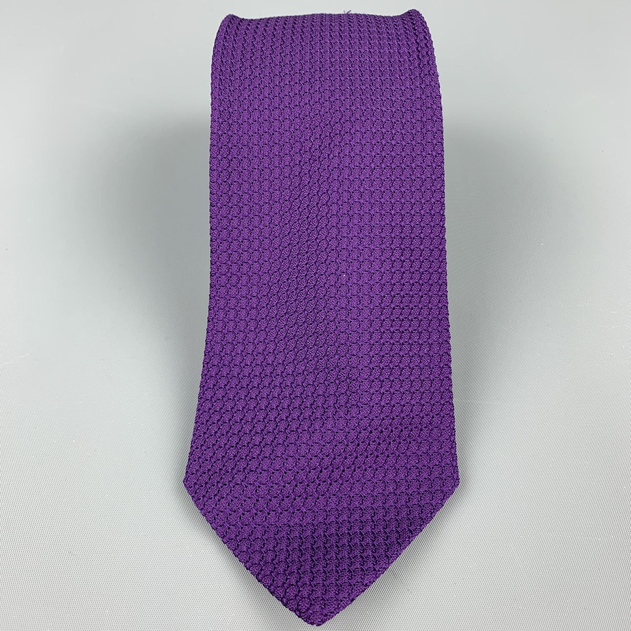 DRAKES LONDON necktie comes in a purple knitted silk. Hand made in England.

Very Good Pre-Owned Condition.

Width: 3 in. 

SKU: 103747
Category: Tie

More Details
Brand: DRAKES LONDON
Pattern: Woven
Color: Purple
Fabric: Silk
Age Group: