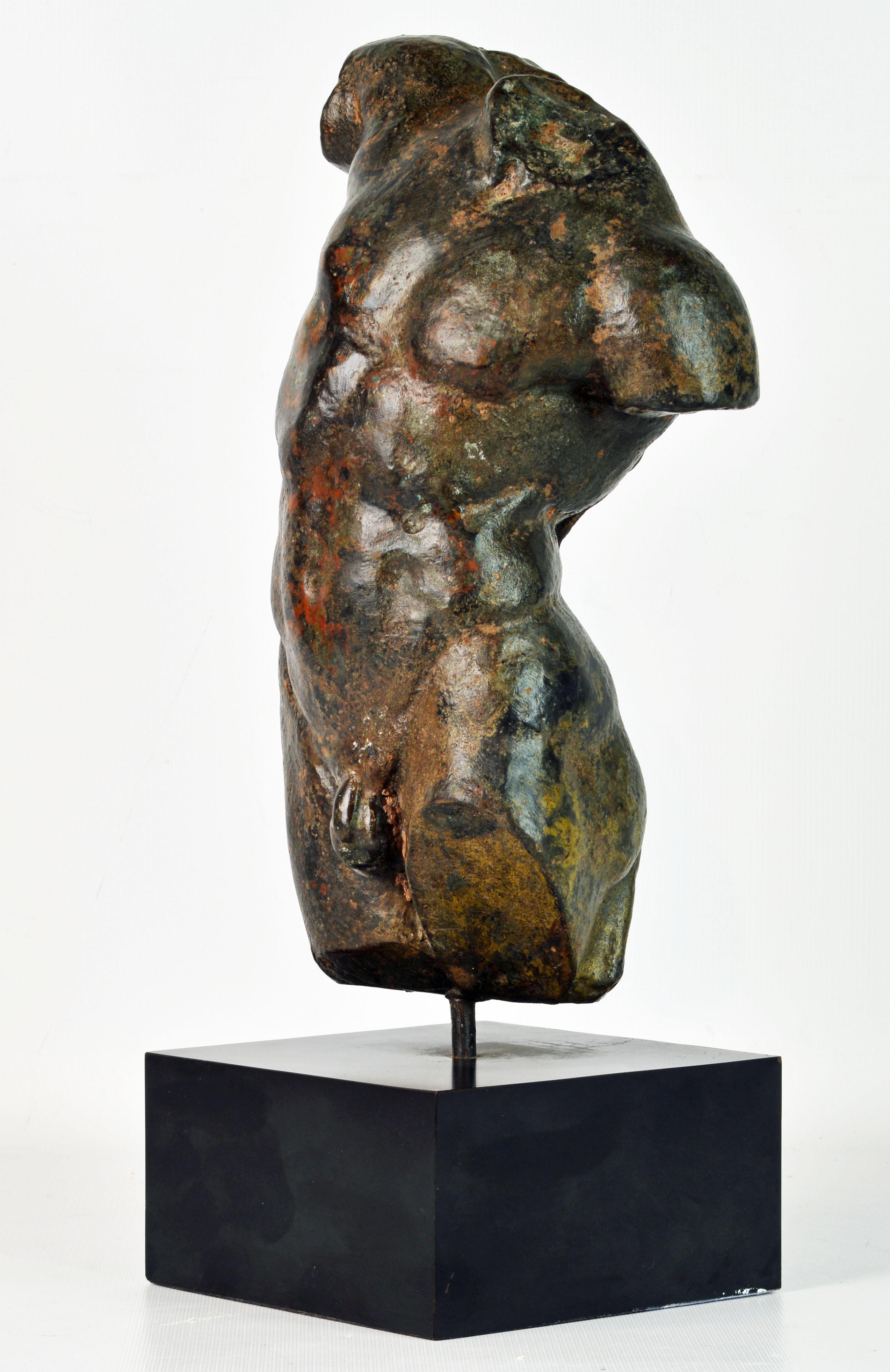 Standing almost 17 inches tall, made of marble composition and very heavy this sculpture has been finished with a rich earthy patina featuring oxide red, brown, black, ochre and verdigris tones making it an ever changing sight from all angles. The