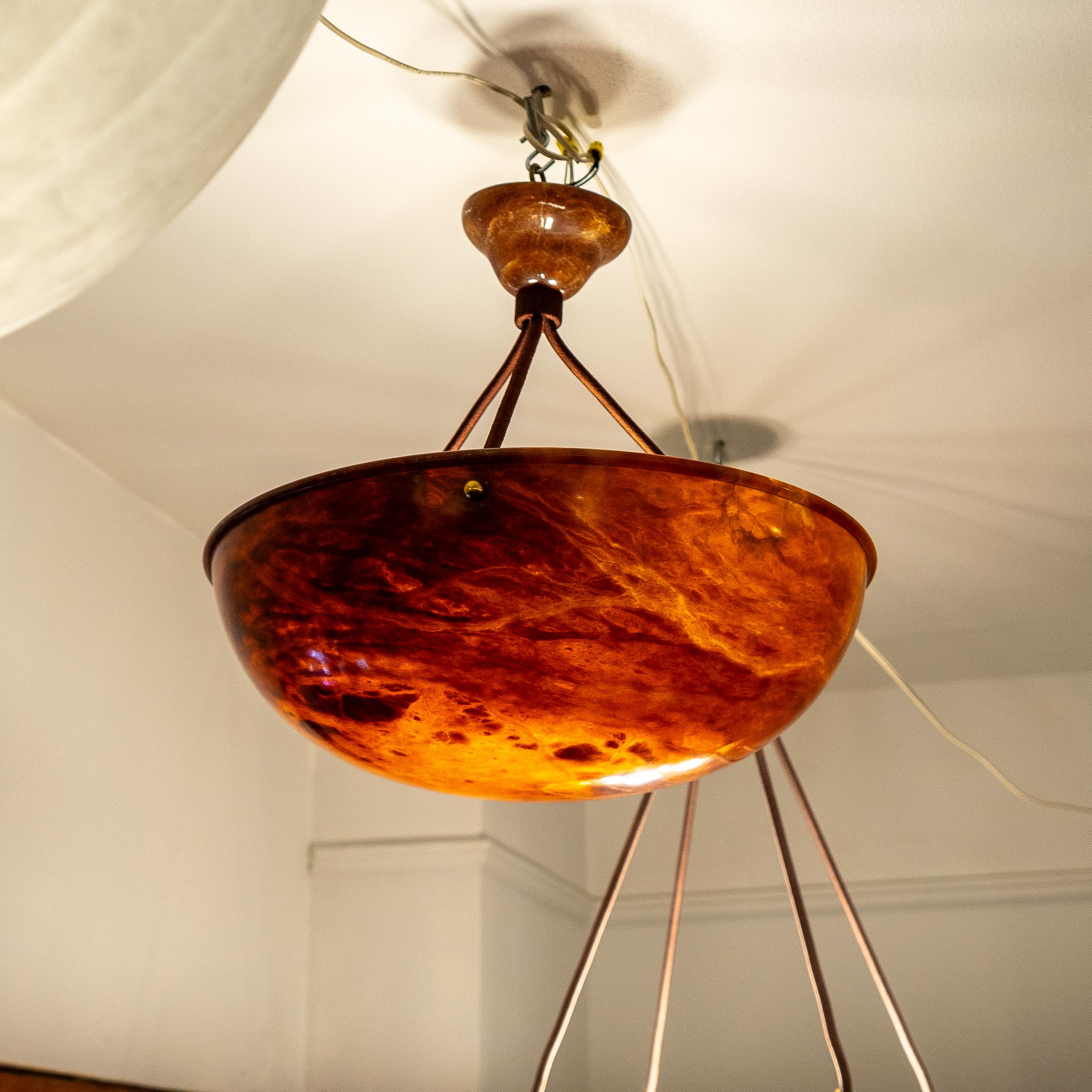 Carved Dramatic Amber Alabaster Pendant, Sweden 1915 For Sale