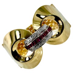 Bracelet rétro américain spectaculaire en platine, or, rubis et diamants