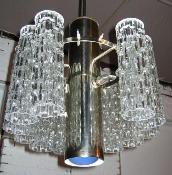 Wonderful chrome and glass ceiling fixture. Glass tubes are in shape of bamboo. Light provided by three bulbs near top of base and one spotlight at bottom; switch on base turns on/off all bulbs.