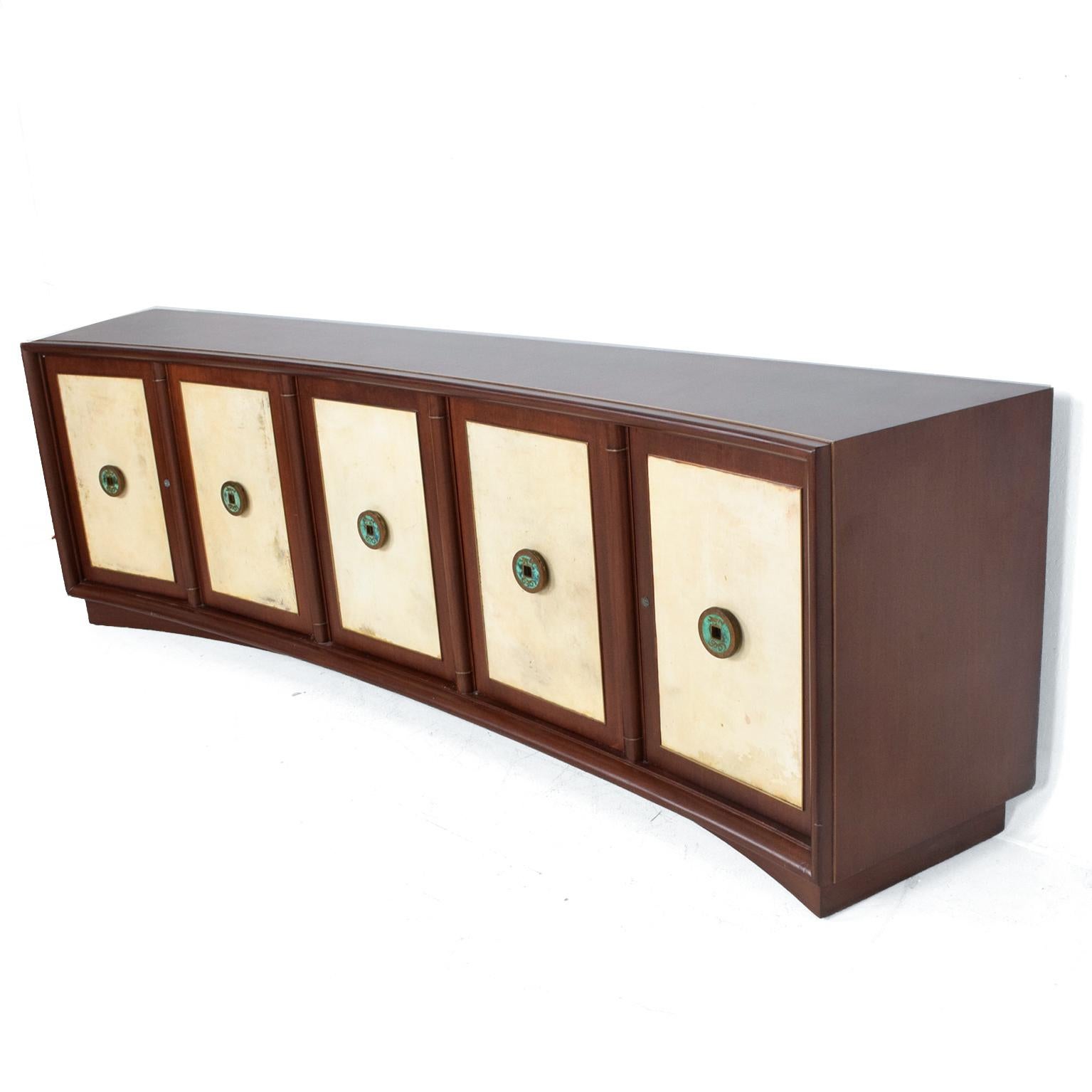 Credenza
Curved Credenza Cabinet in mahogany and goatskin Pepe Mendoza Malachite Pulls. Mexico circa 1950s Modernism.
Doors have original goatskin Malachite and Solid Brass Pulls by Pepe Mendoza. 
Credenza has five cabinets. Right side has four