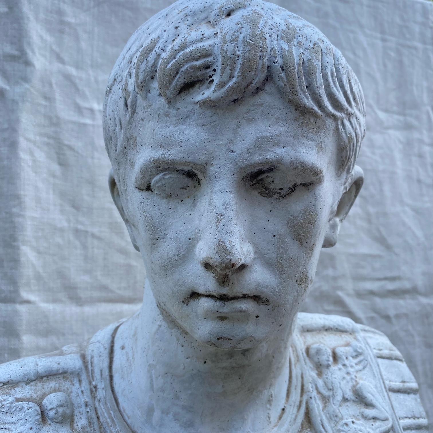 Emperor Augustus Caesar, Roman statesman and military leader, first Emperor of the Roman Empire, captured in an impressive hand sculpted bust from France, circa 1890. The sculpture represents the face of a young soldier/military man Julius Caesar, a