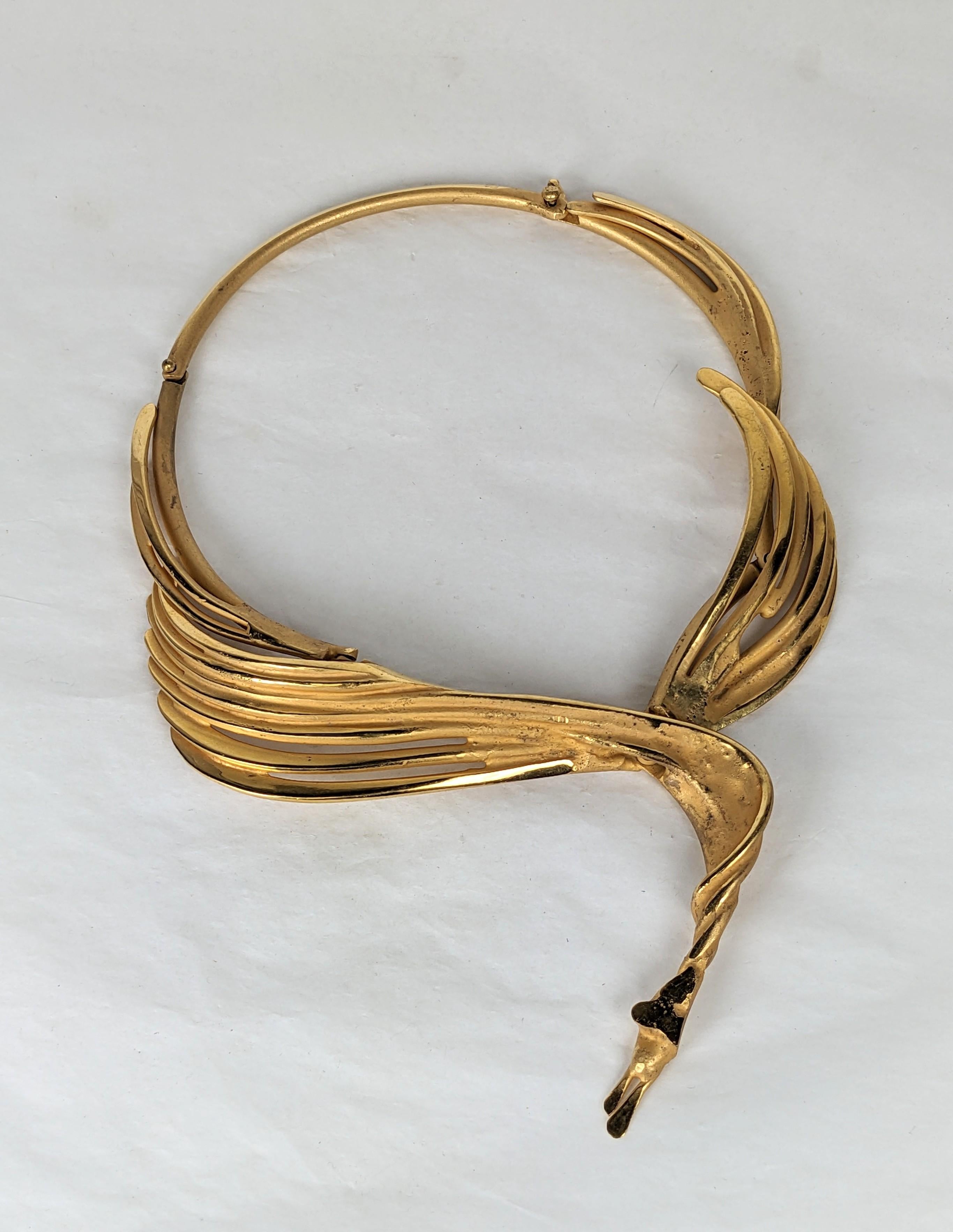 Large and Dramatic French Winged Bronze Artisanal Collar in the Brutalist style from the 1980's. Signed by the maker (Bonillez?) and purchased in a gallery in Paris in the 1980's.
Handmade and heavily articulated with curved rods which are formed