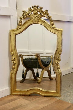 Dramatic Gilt-wood French Wall Mirror  The Mirror has a simple carved gilt Frame