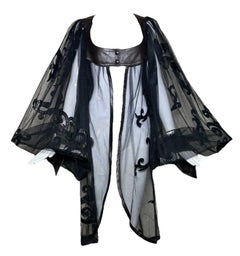 Dramatische Jacke mit filigranem Leder und Tüll-Ballonärmeln